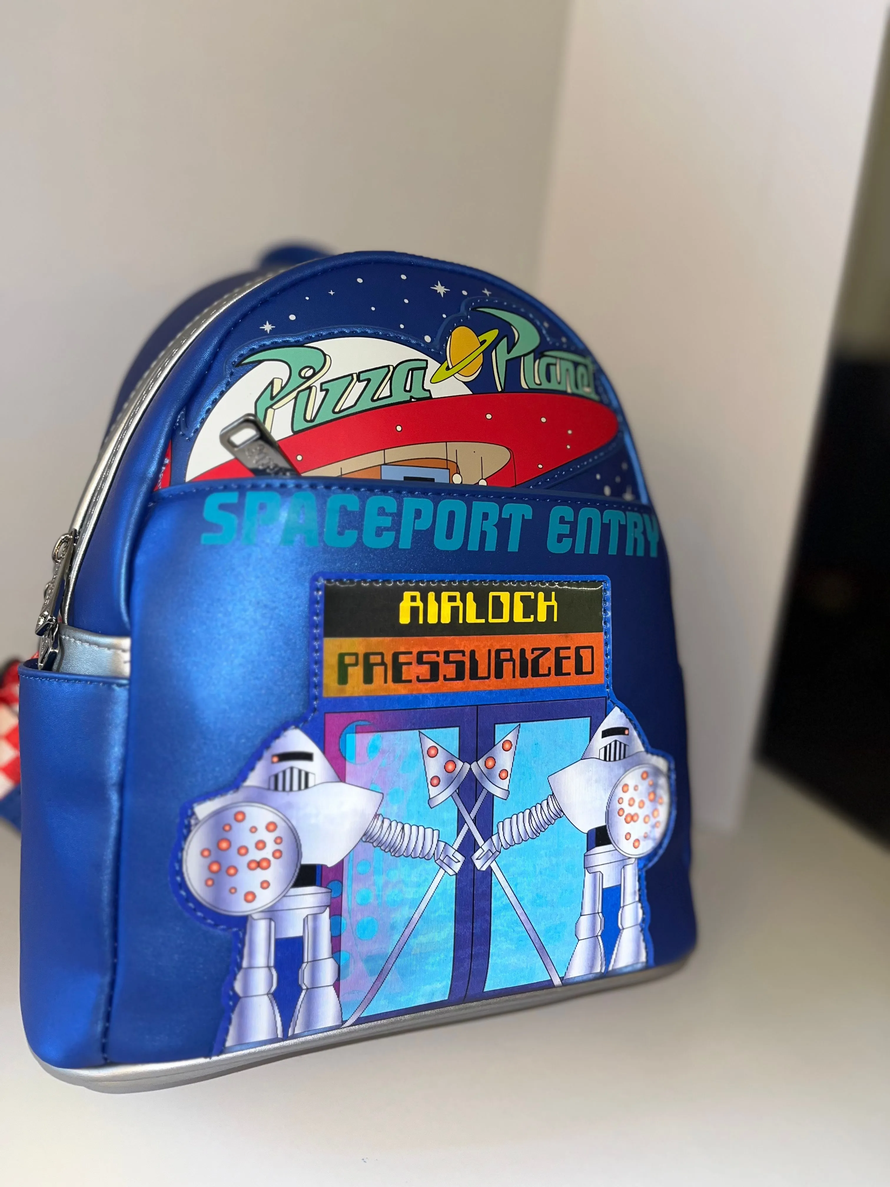 Product image for Loungefly Pixar Toy Story Pizza Planet Space Entry Mini Backpack