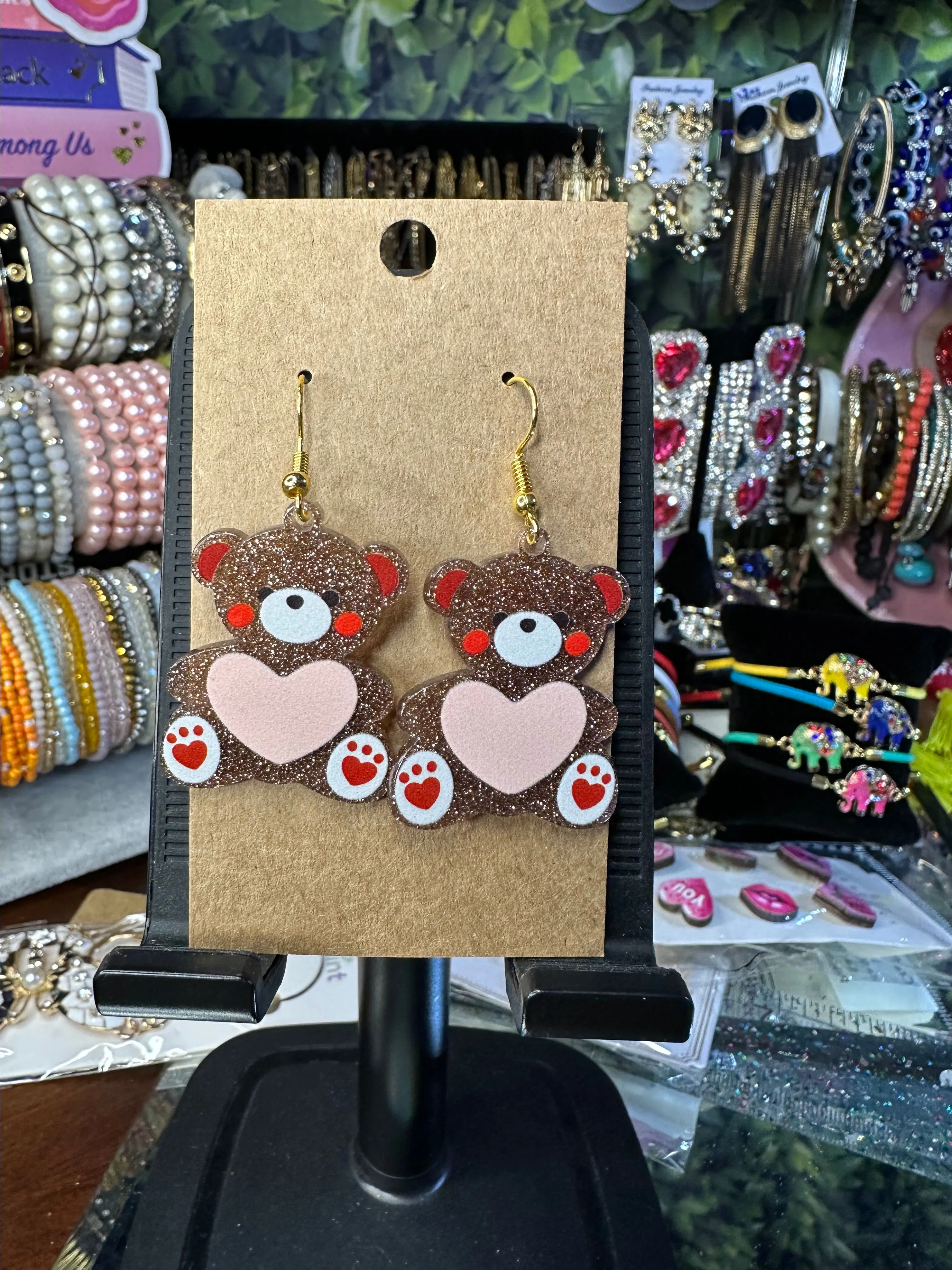 Product image for Glitter, resin teddy bear heart earrings