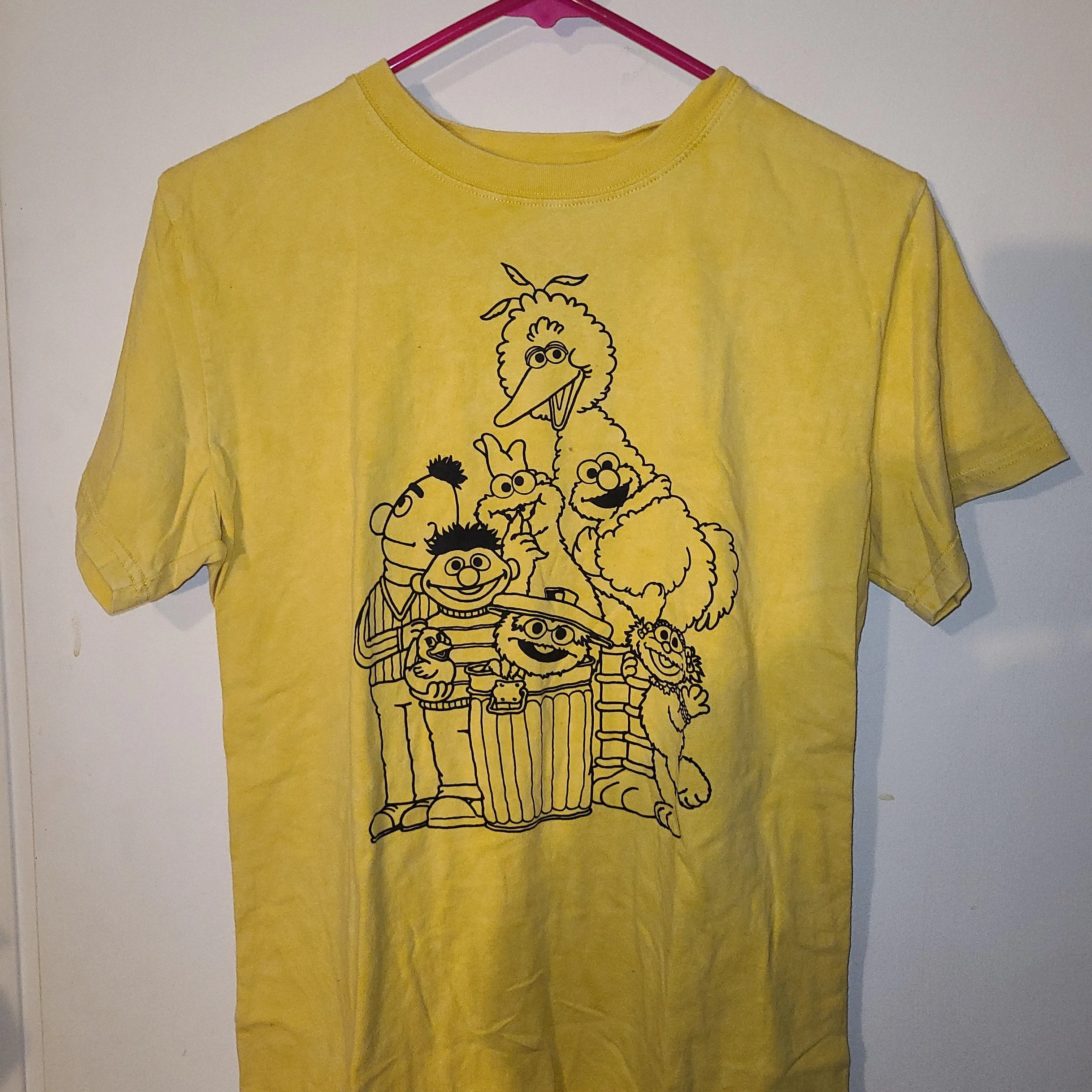 Product image for Mighty Fine Sesame Street Yellow T Shirt Size Medium. (A148)