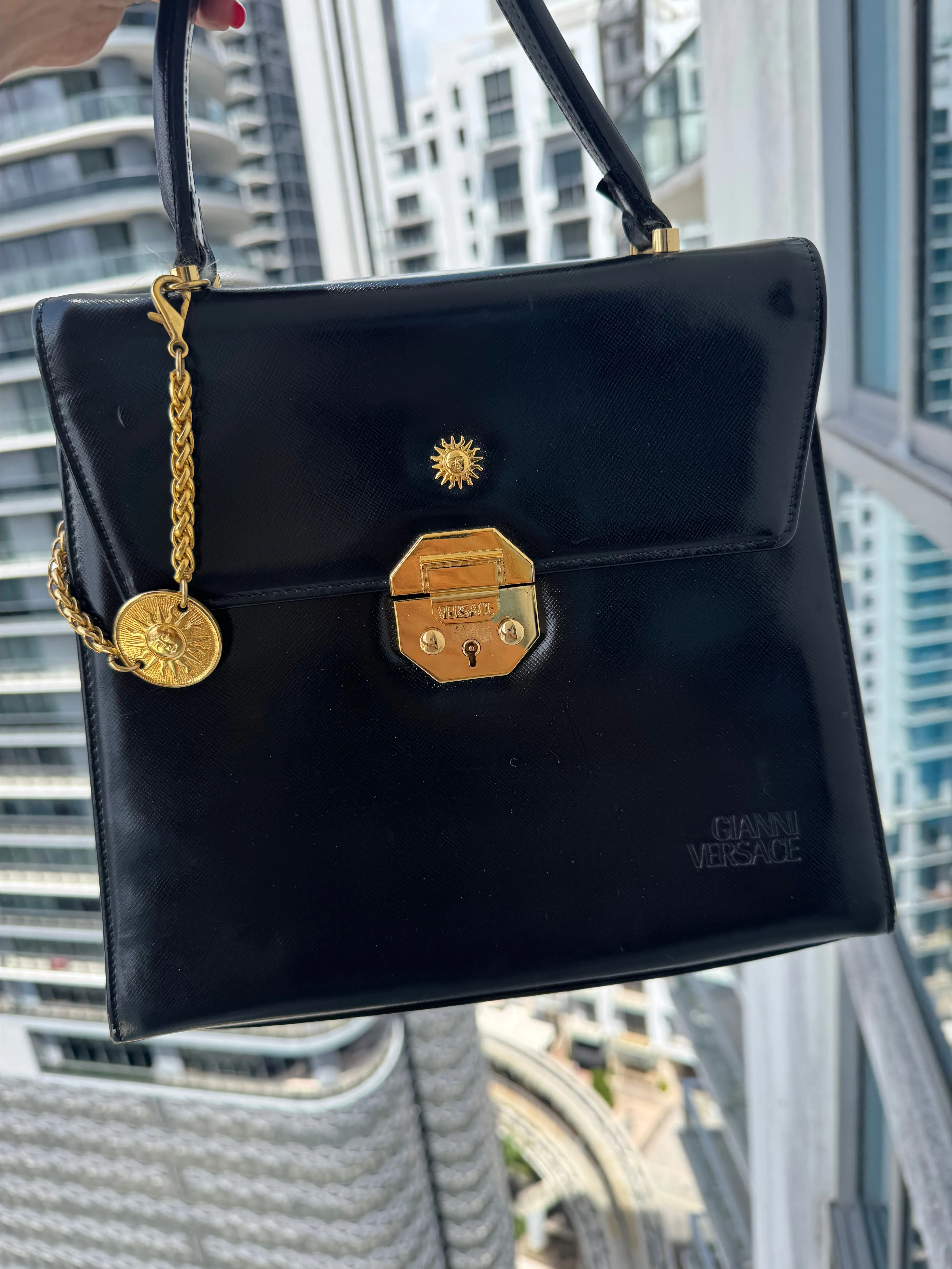 Product image for 41. Gianni Versace Top Handle Charm Leather Bag