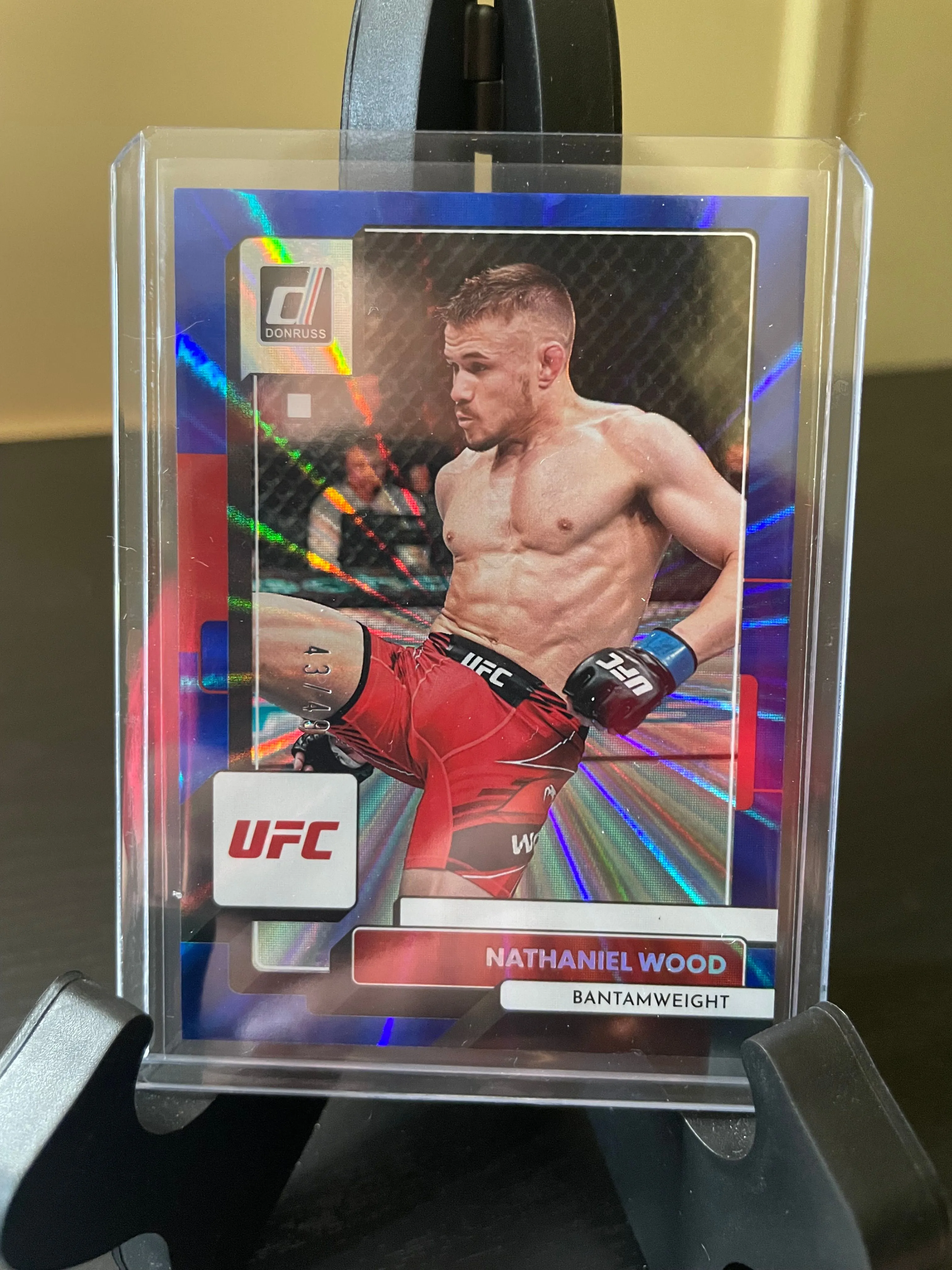 Product image for 2023 Donruss UFC Nathaniel Wood Holo Blue Laser /49