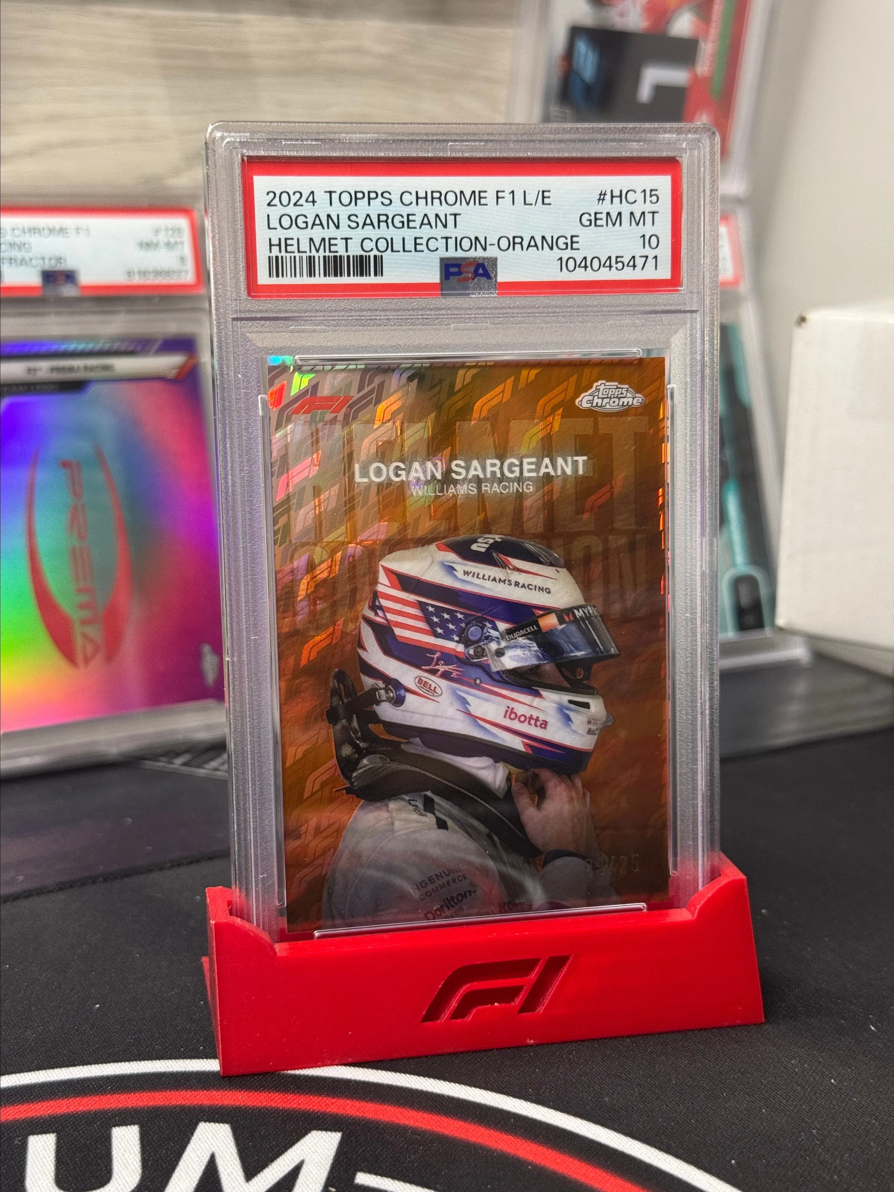 Product image for 2024 Topps Chrome Formula 1 Logofractor - Logan Sargaent Orange Helmet /25