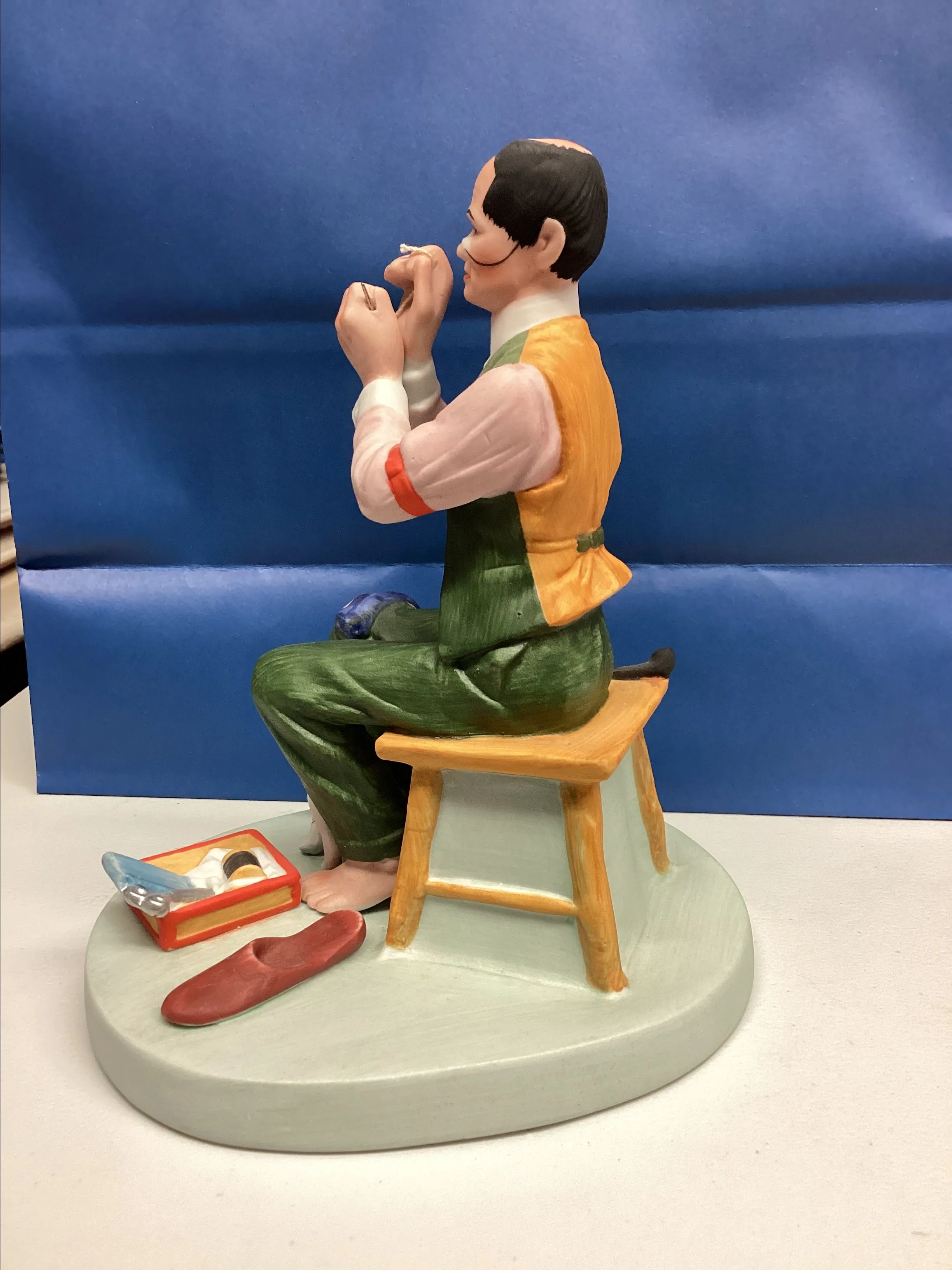 Product image for Norman Rockwell "Man Threading a Needle"