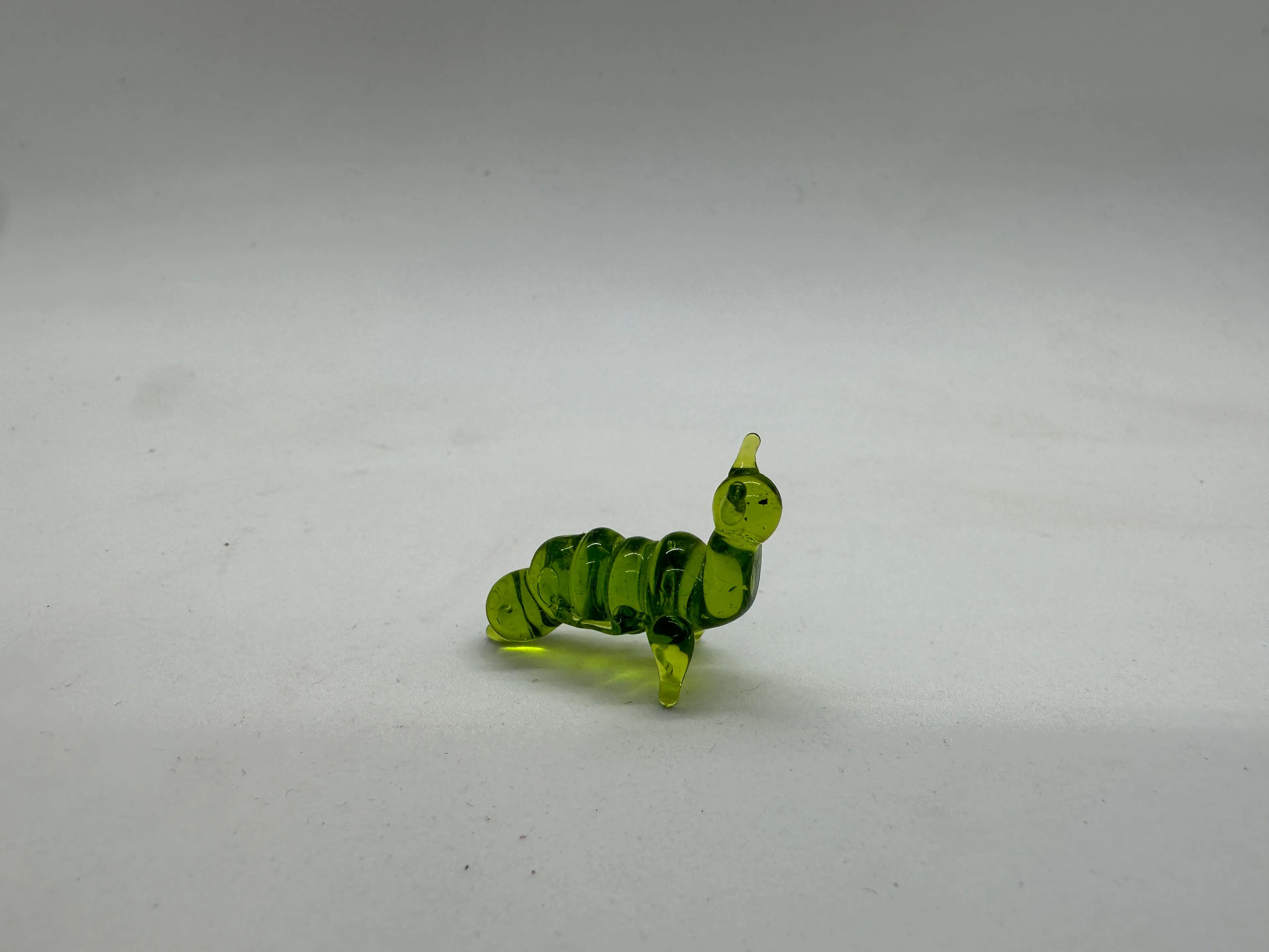 Product image for 1” green glass caterpillar