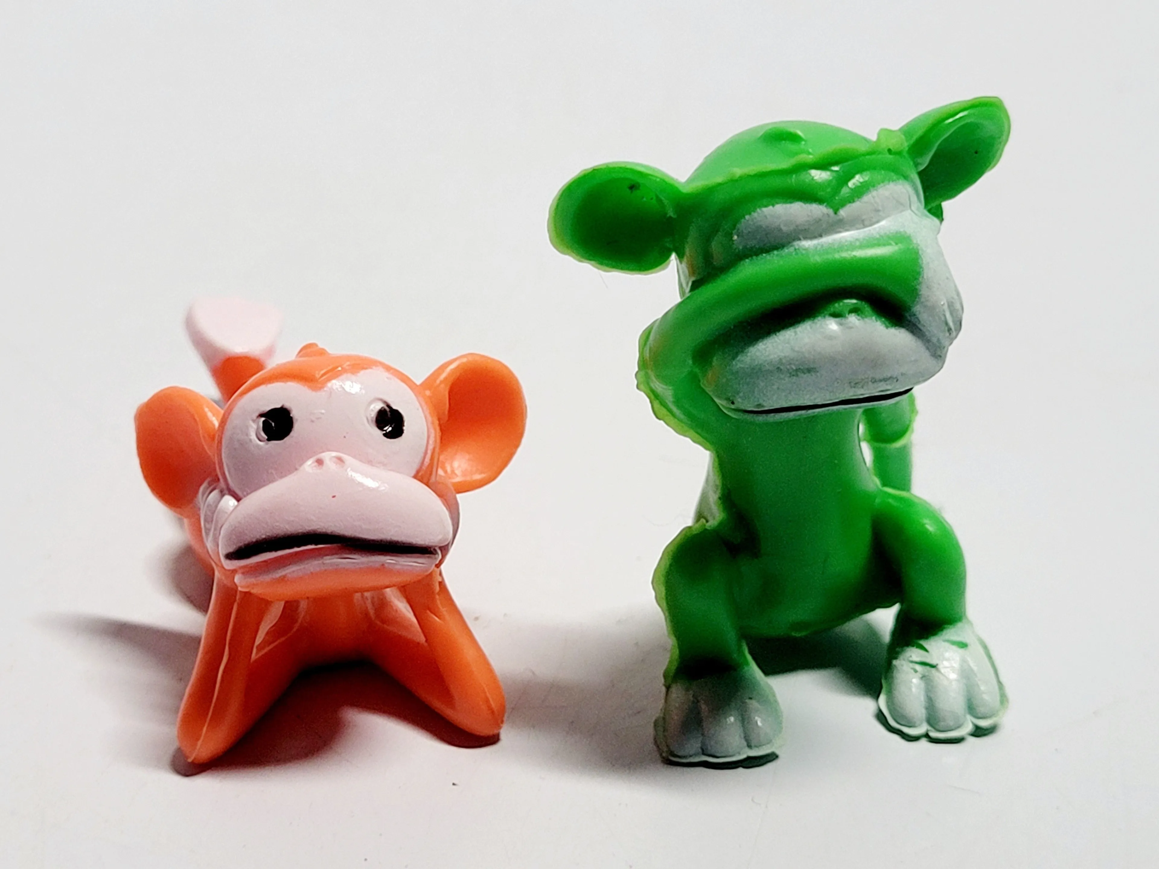 Product image for (Lot Of 2) Mini 2" Monkeys Orange/Green Party Favors Cake Toppers Figures Toys. The product is a set