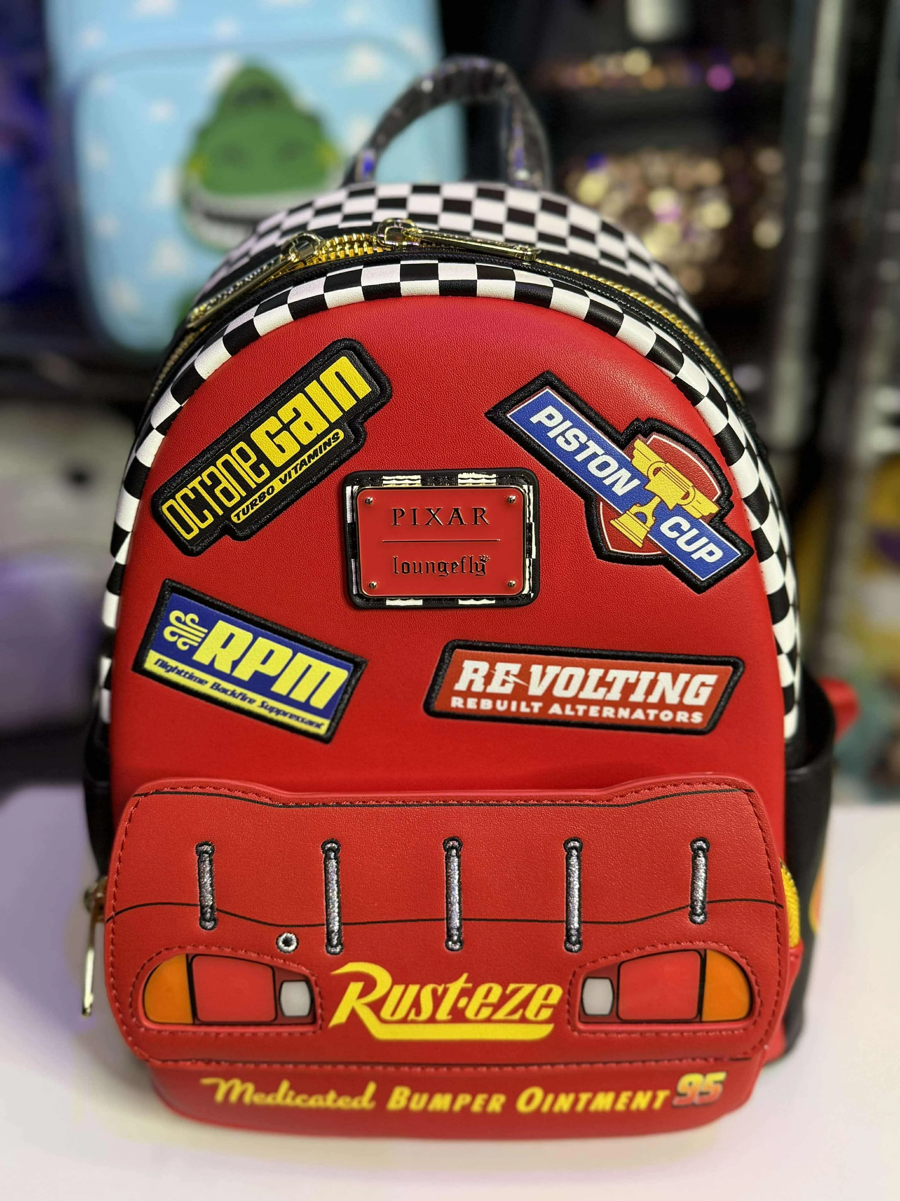 Product image for Loungefly Disney Pixar Cars Lightning McQueen Rust-eze Light-up Mini Backpack