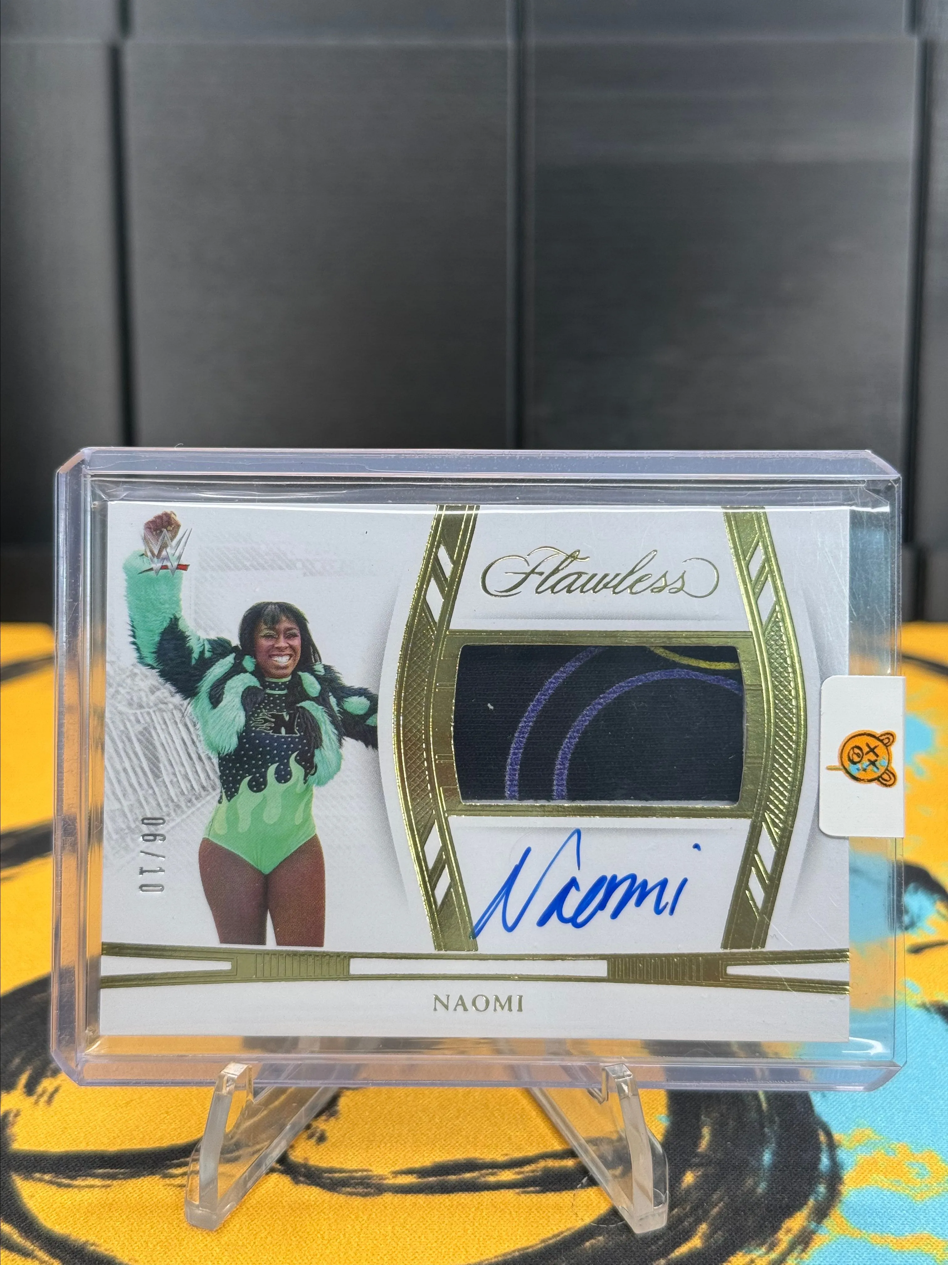 Product image for WWE 2024 Naomi Flawless Patch Auto Gold /10