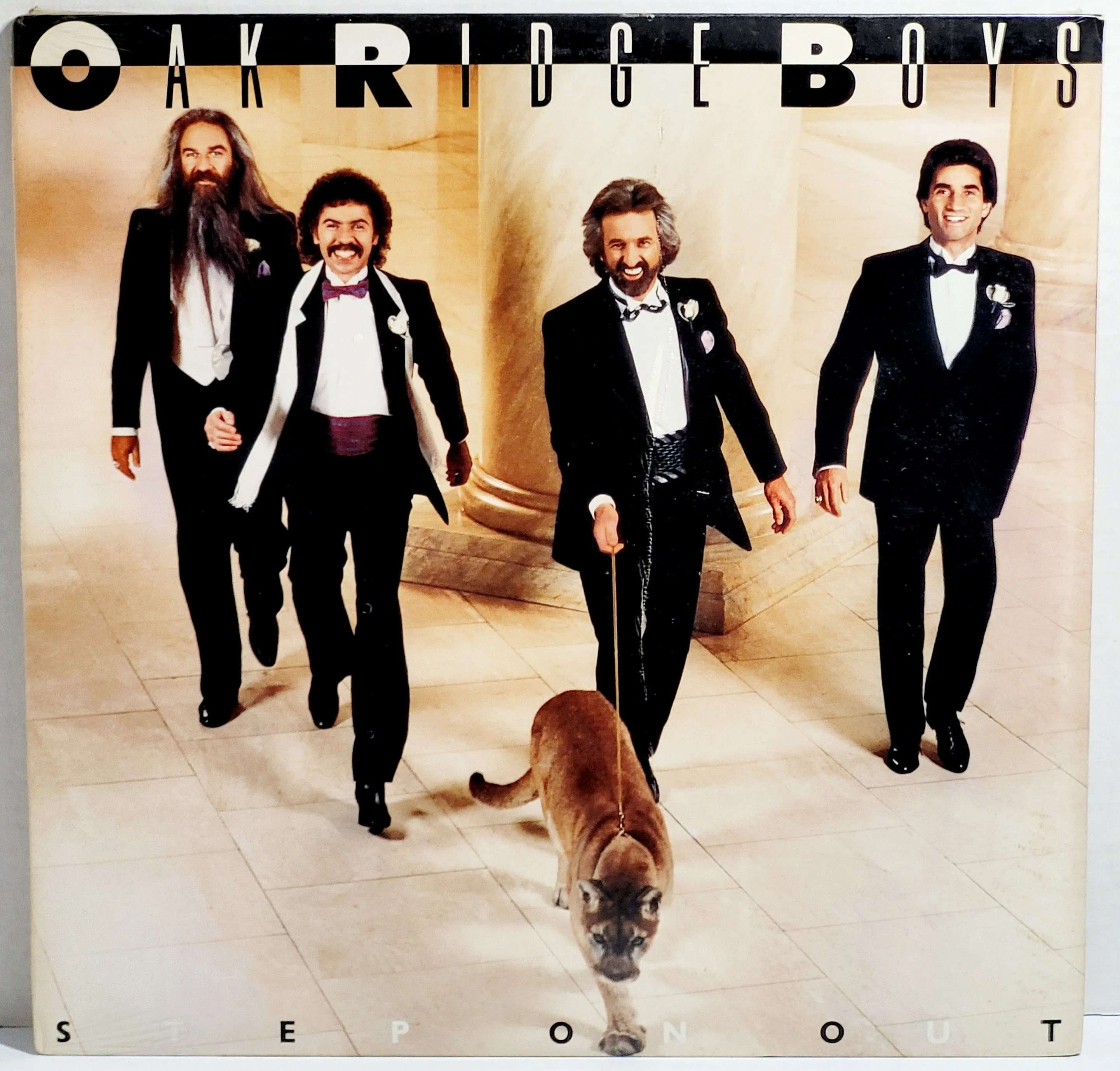Product image for Brand New Sealed 1985 Vinyl Album Oak Ridge Boys "Step On Out" Country LP Record. The image depicts 