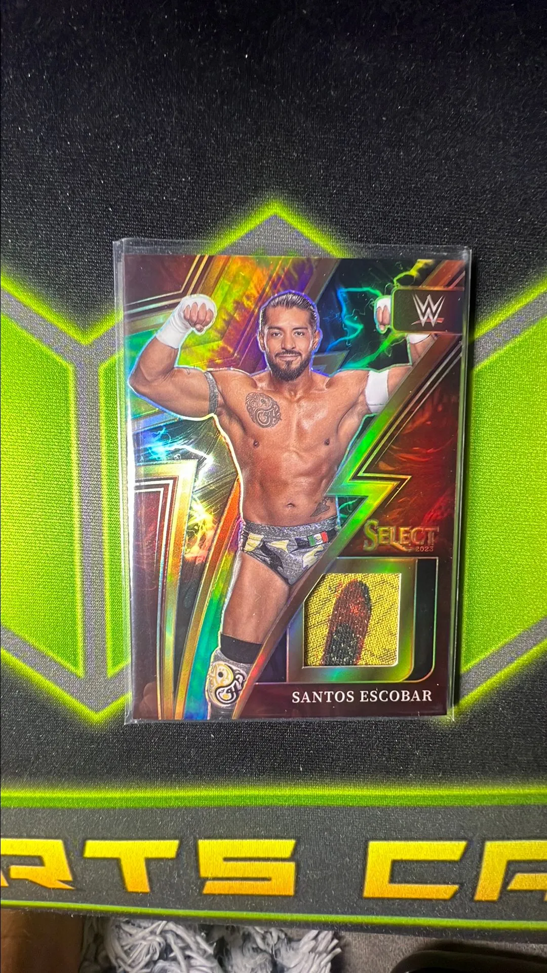 Product image for 2023 Santos Escobar WWE Panini Select Prizm Tie Dye /25 Refractor Game Used Patch