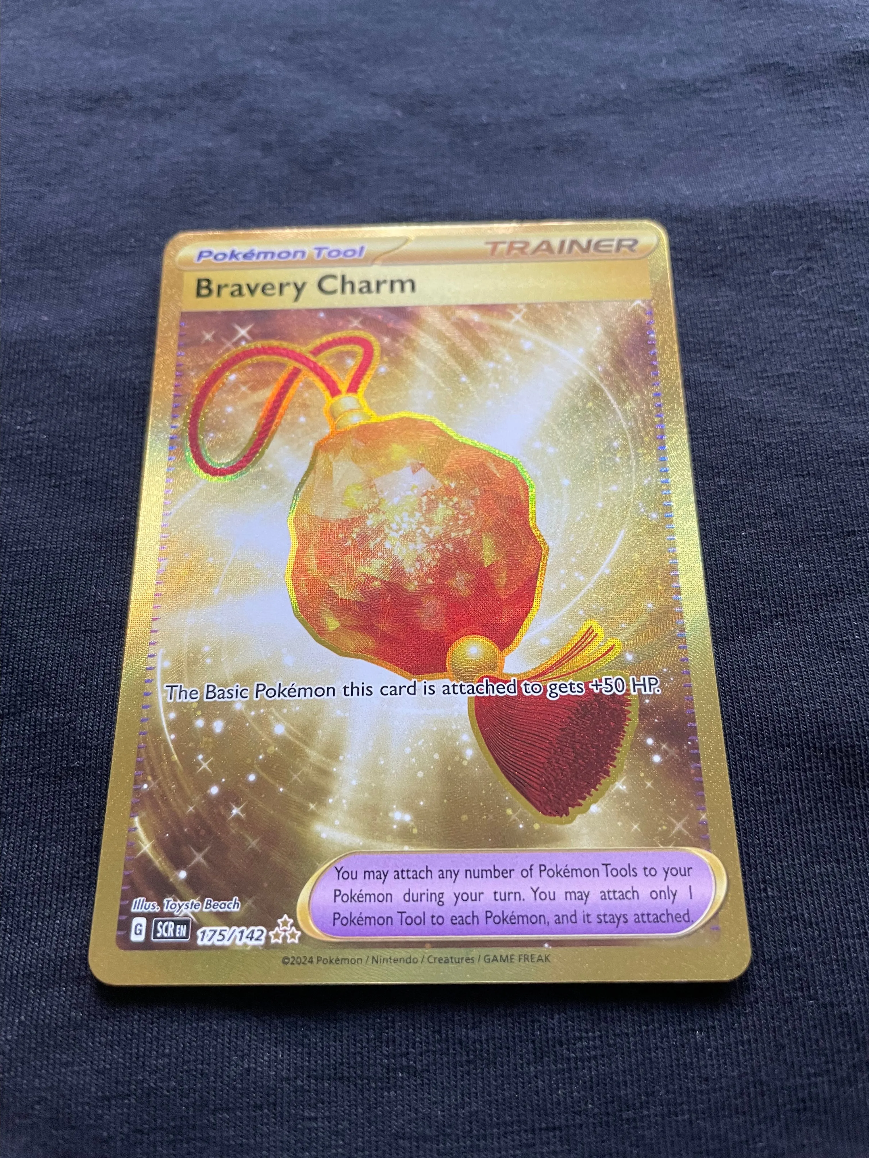 Bravery Charm Full Art Gold Trainer - Pokmon Cards Stellar Crown   Whatnot: Shop, Sell, Connect