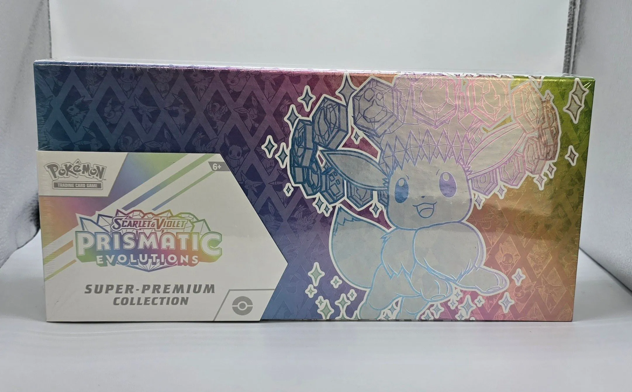 Product image for pokemon prismatic evolutions super premium collection 