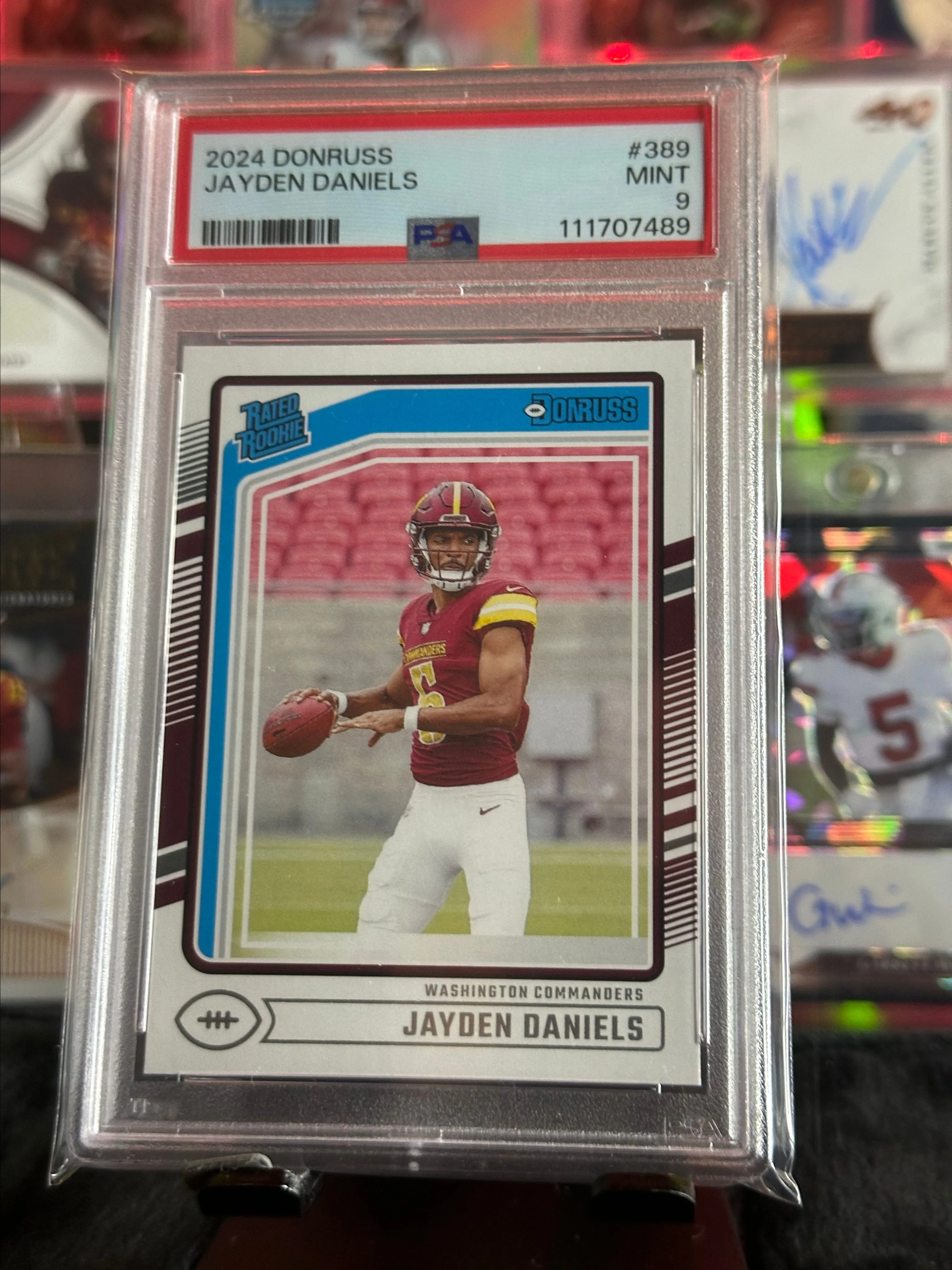 Product image for 2024 PANINI DONRUSS #389 JAYDEN DANIELS ROOKIE RC PSA 9