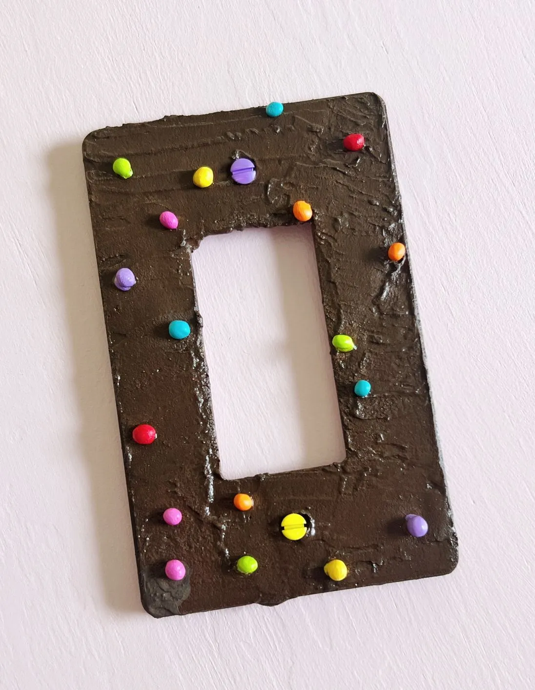 Product image for Cosmic Brownie Single Paddle Outlet Cover