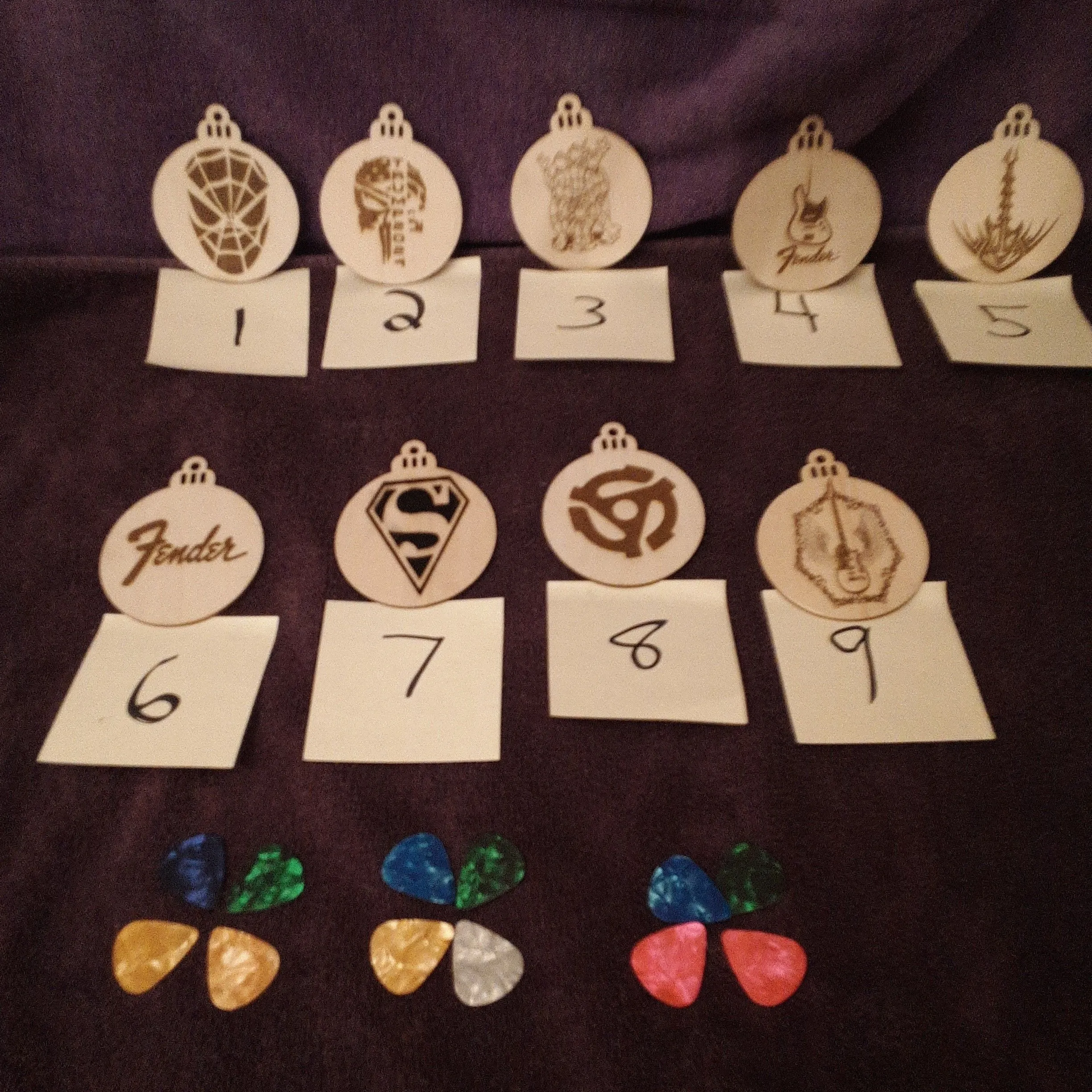 Product image for (12) Picks and custom laser engraved Christmas ornament (your choice)