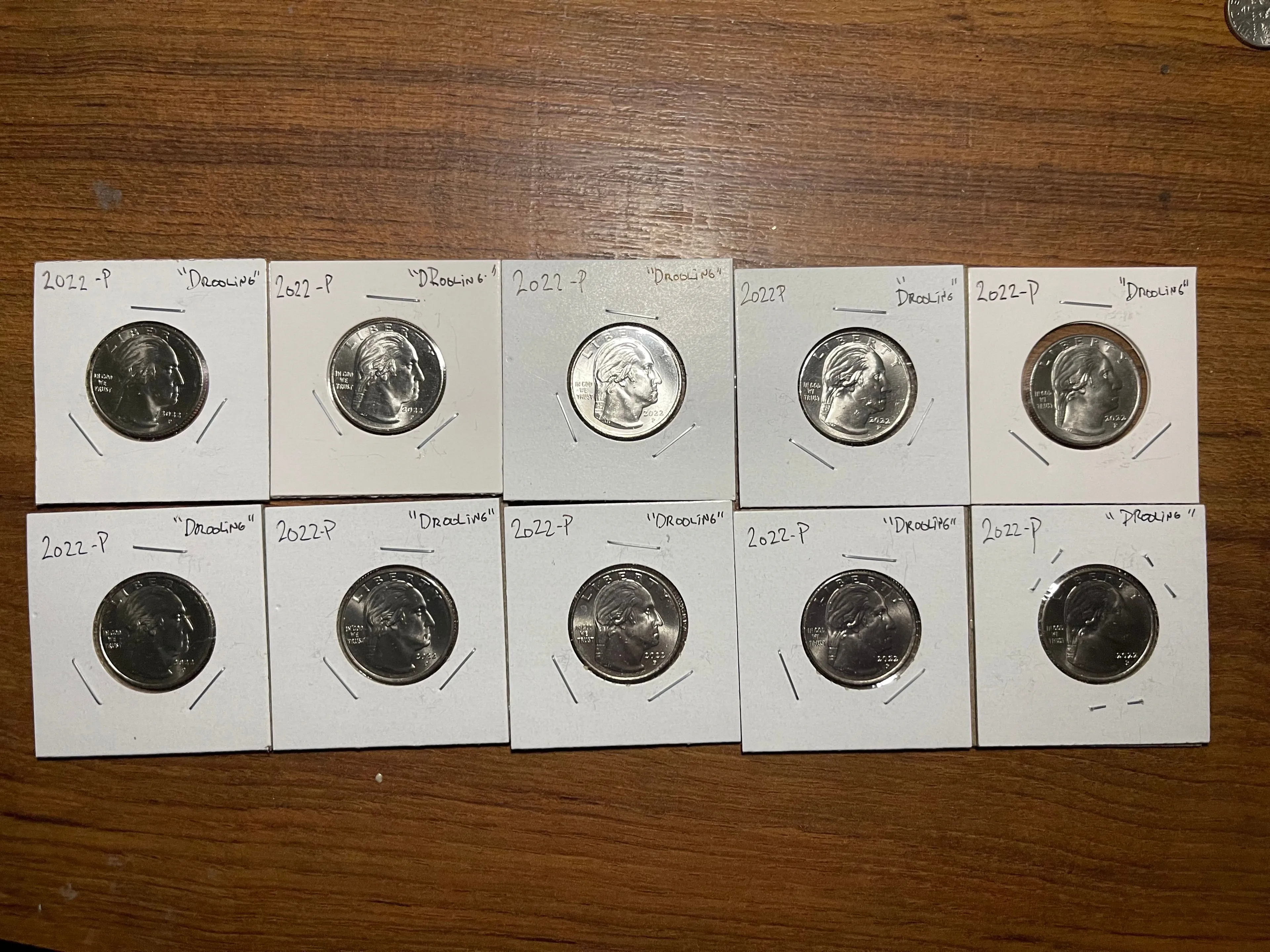 Product image for Lot of 10 2022 Drooling Washington quarters