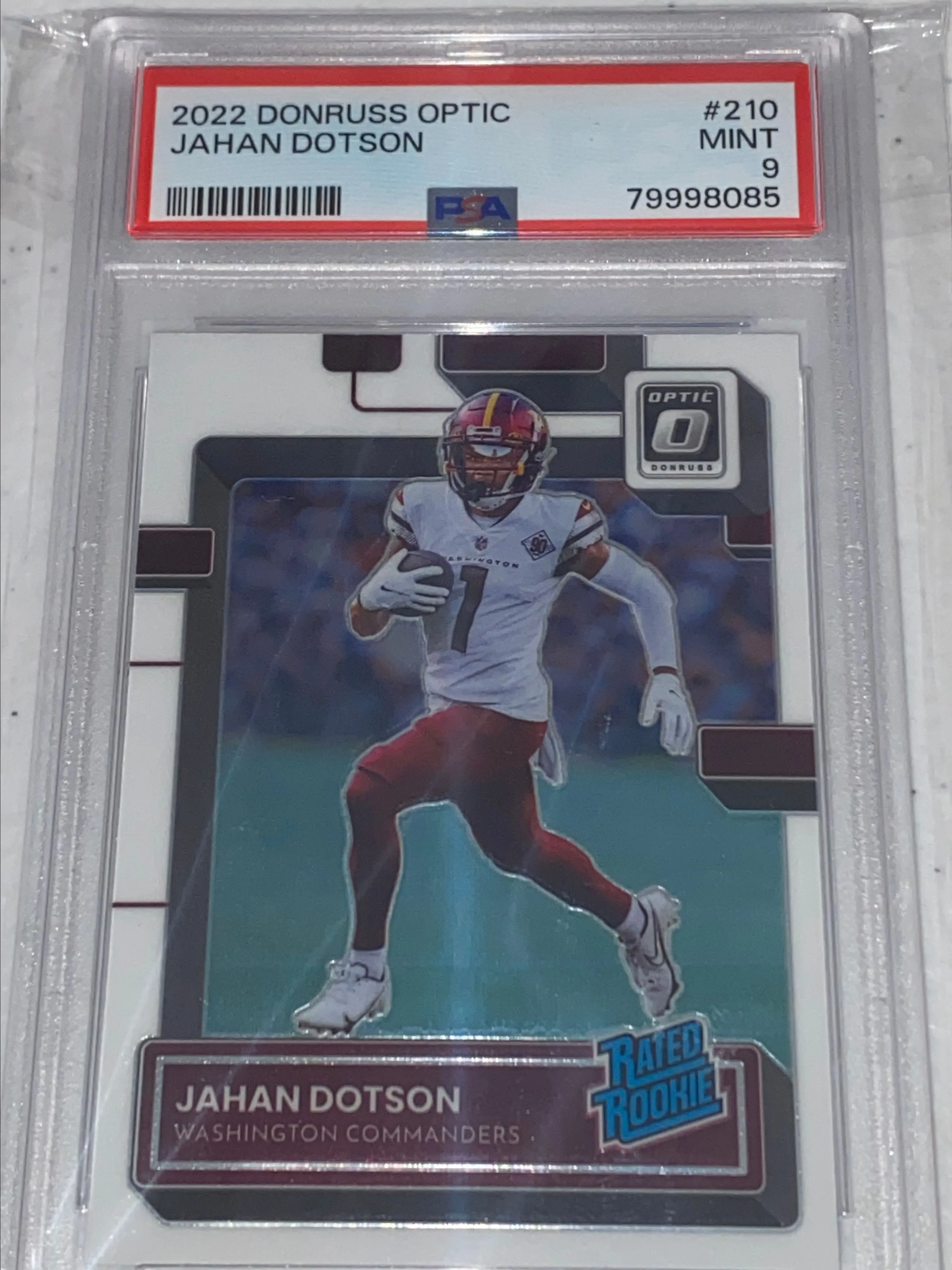 Product image for Jahan Dotson 2022 Panini Donruss Optic Rated Rookie #210 PSA 9 Commanders