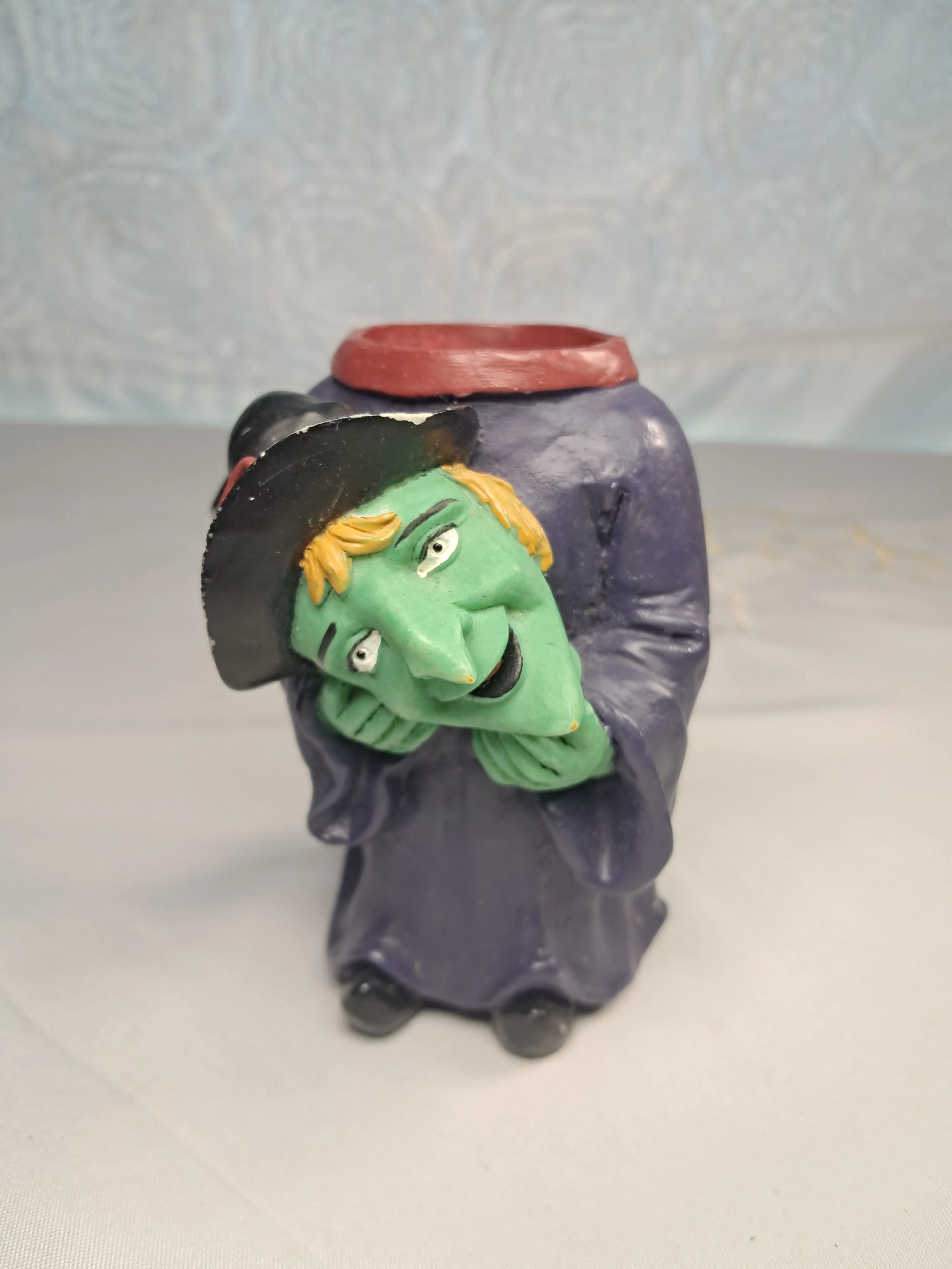 Product image for #23. Witch Holding Head Candle Holder 