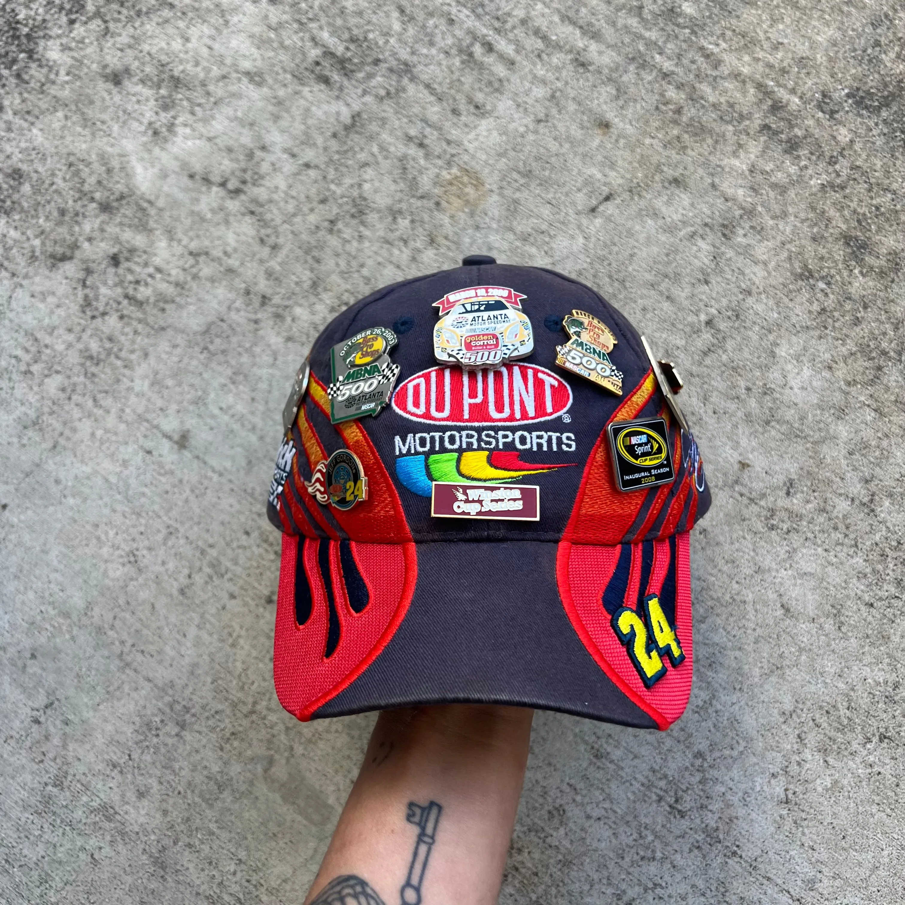 Product image for vintage NASCAR flames hat w hella pins