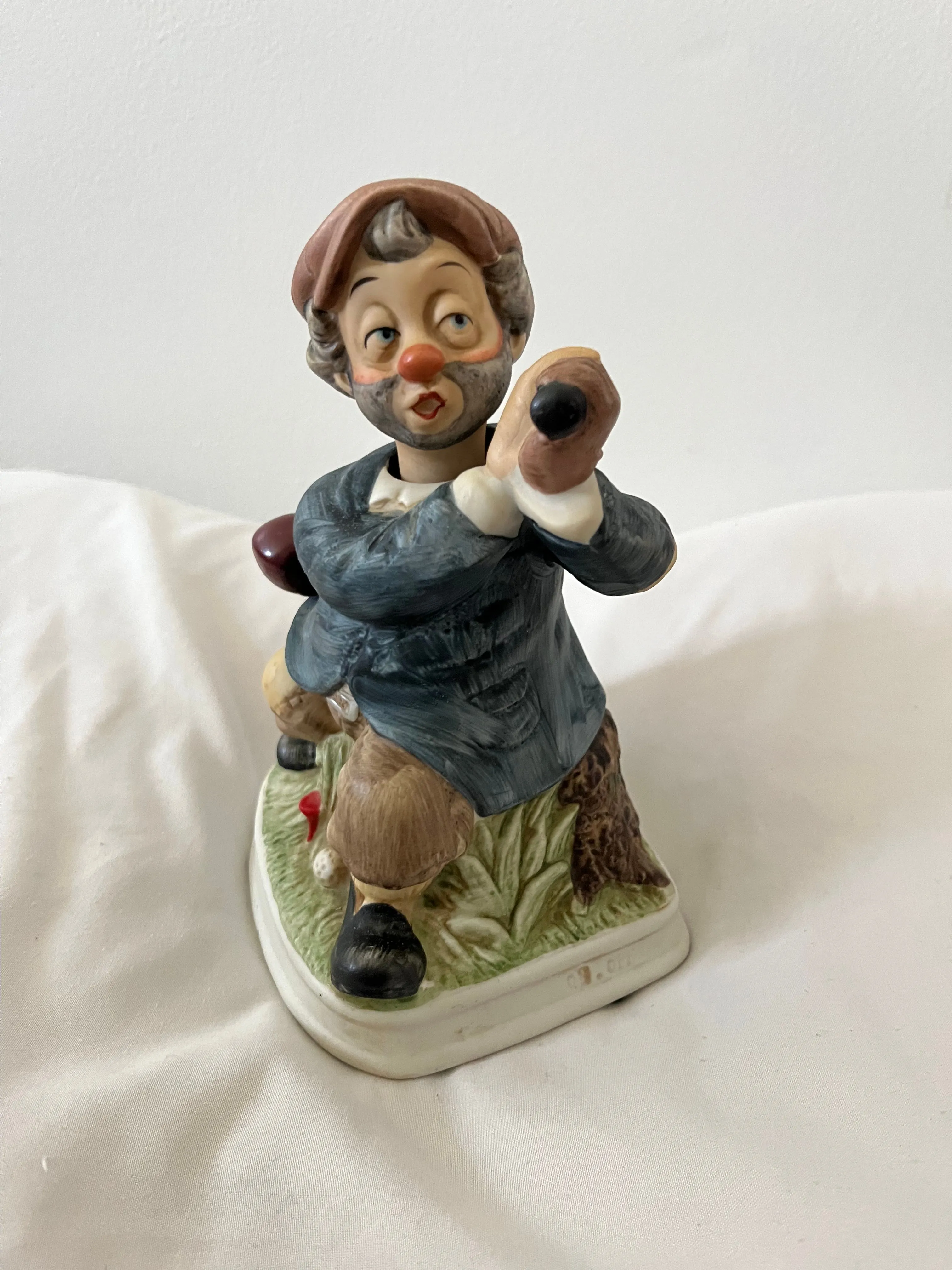 Product image for Waco 8" Golfer Man with Moving Head Music Box Plays IT'S IMPOSIBLE Figurine - WORKS