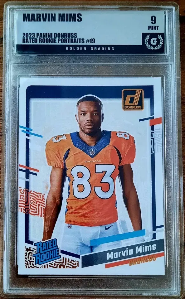 Product image for Marvin Mims 2023 Panini Donruss Rated Rookie Portrait #19 RC Insert Golden Grading (GG) 9 Mint