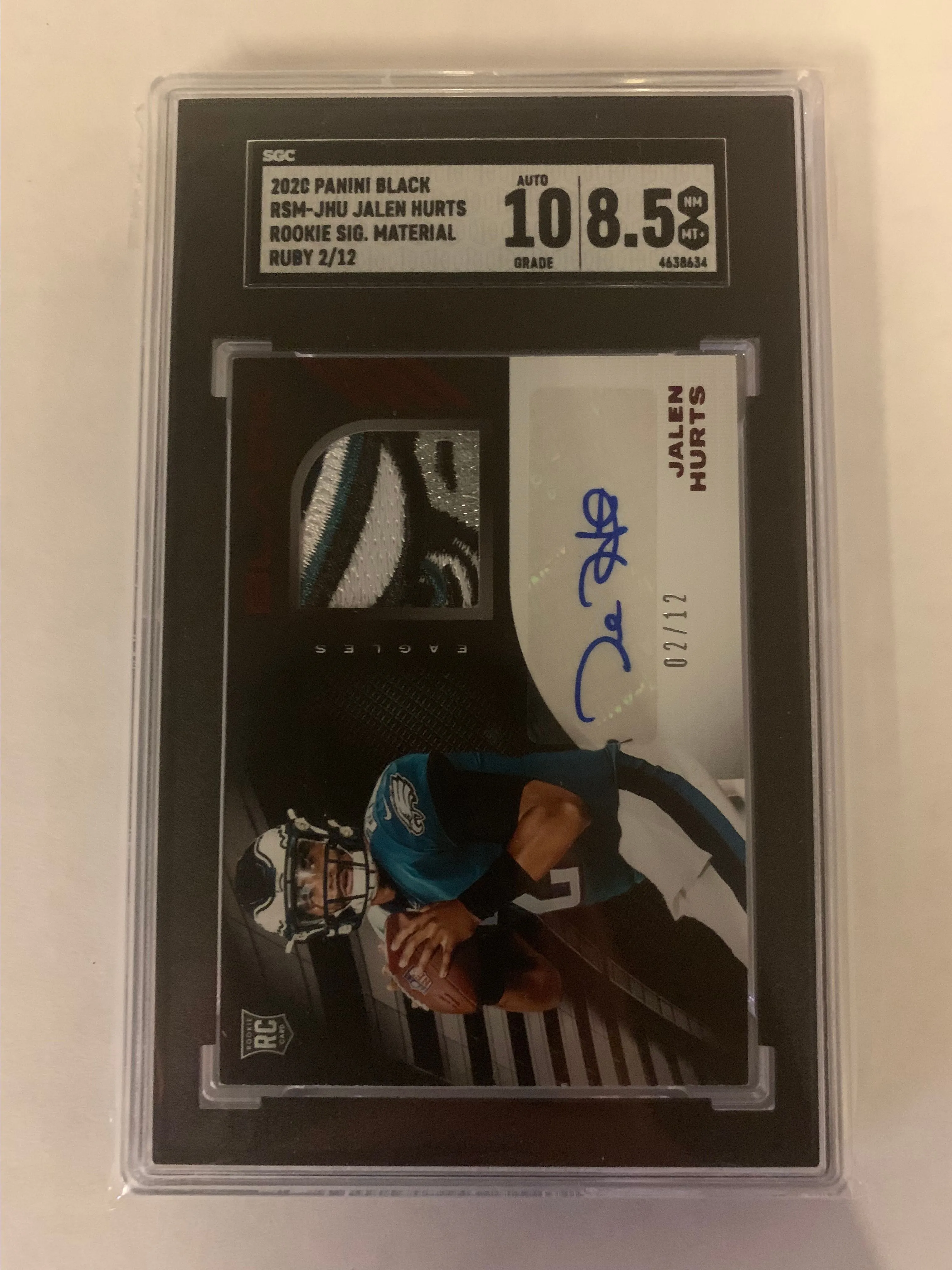 Product image for 2020 Panini Black Jalen Hurts Rookie Signature Materials /12 SGC 8.5/10