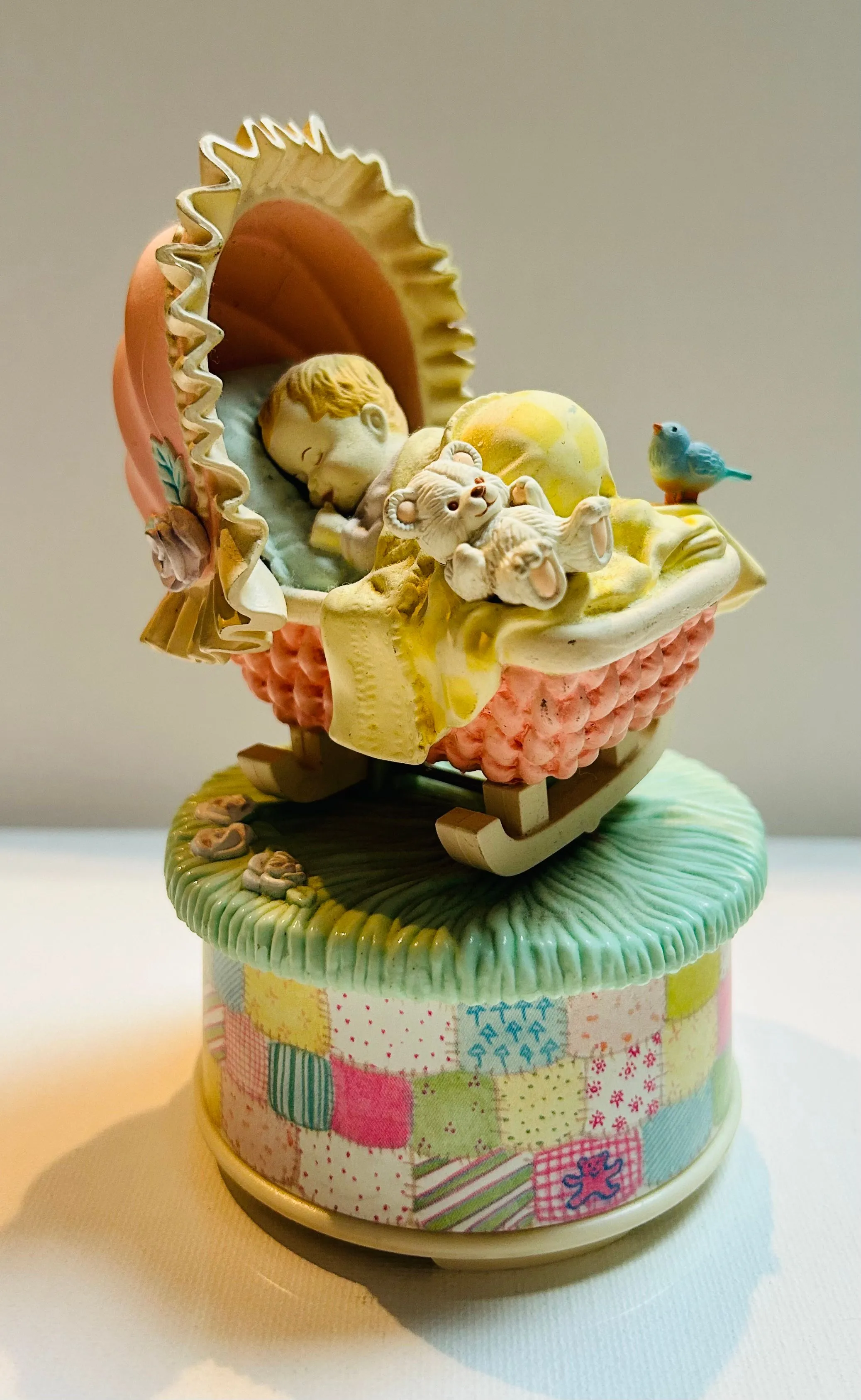 Product image for 1993 Enesco Sleeping Baby In Moving Rocking Cradle Brahms Lullaby Music Box