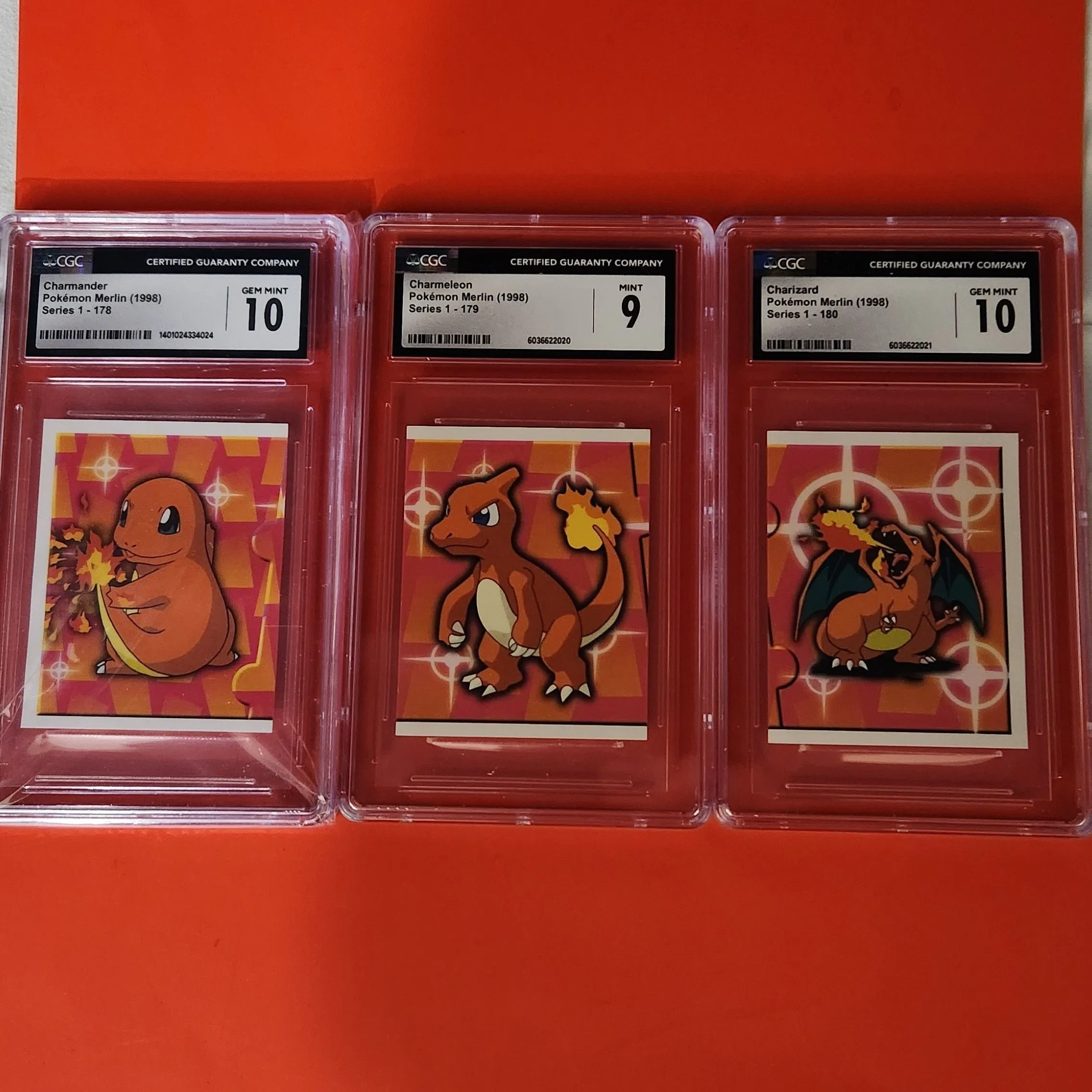 Product image for 1998 Charizard evolution line merlin stickers [3 graded card lot] CGC 