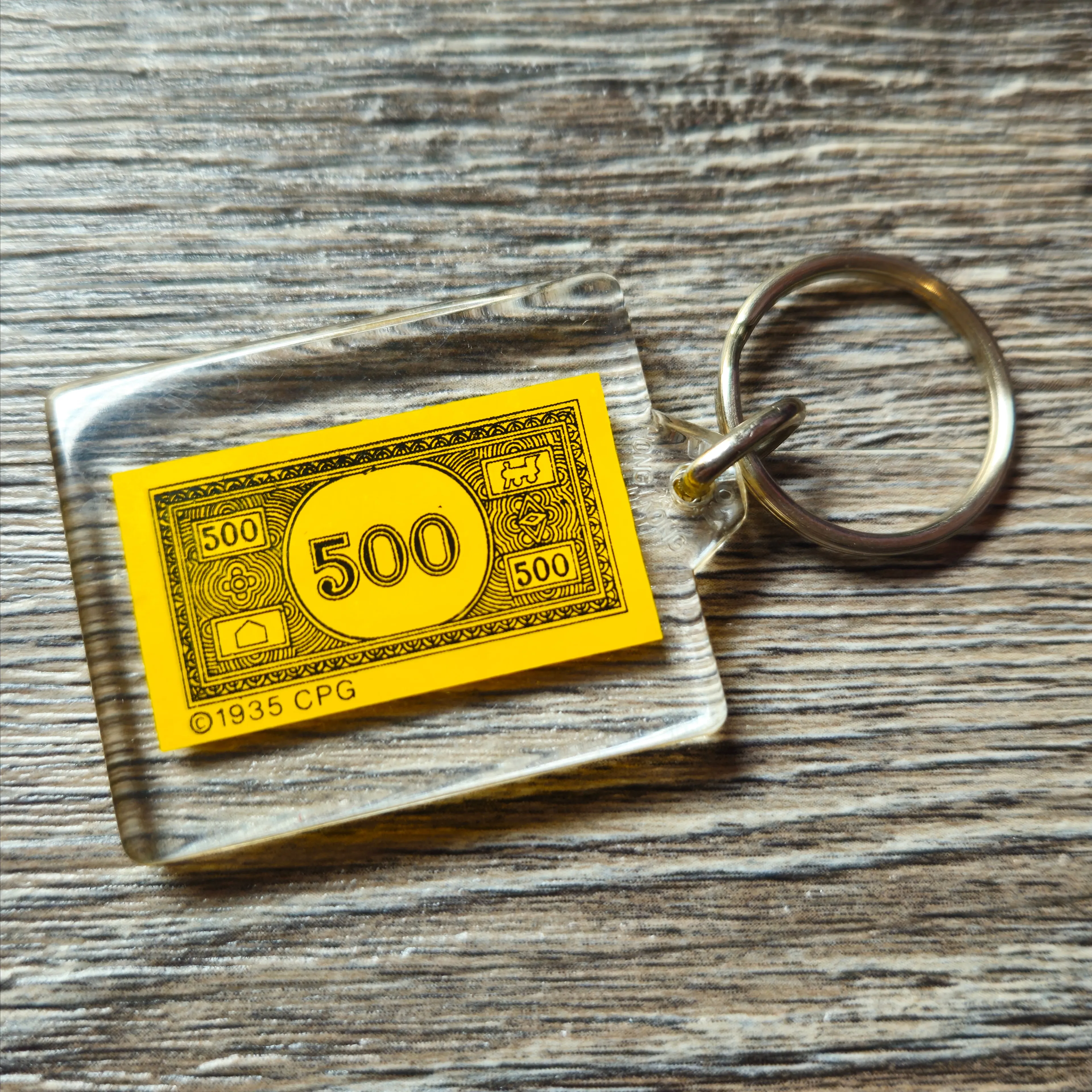 Product image for Vintage Monopoly 500 Bill Keychain – 1935 CPG marked Money in acrylic | Retro Board Game Gift | Classic Game Piece Key Ring | Collectable