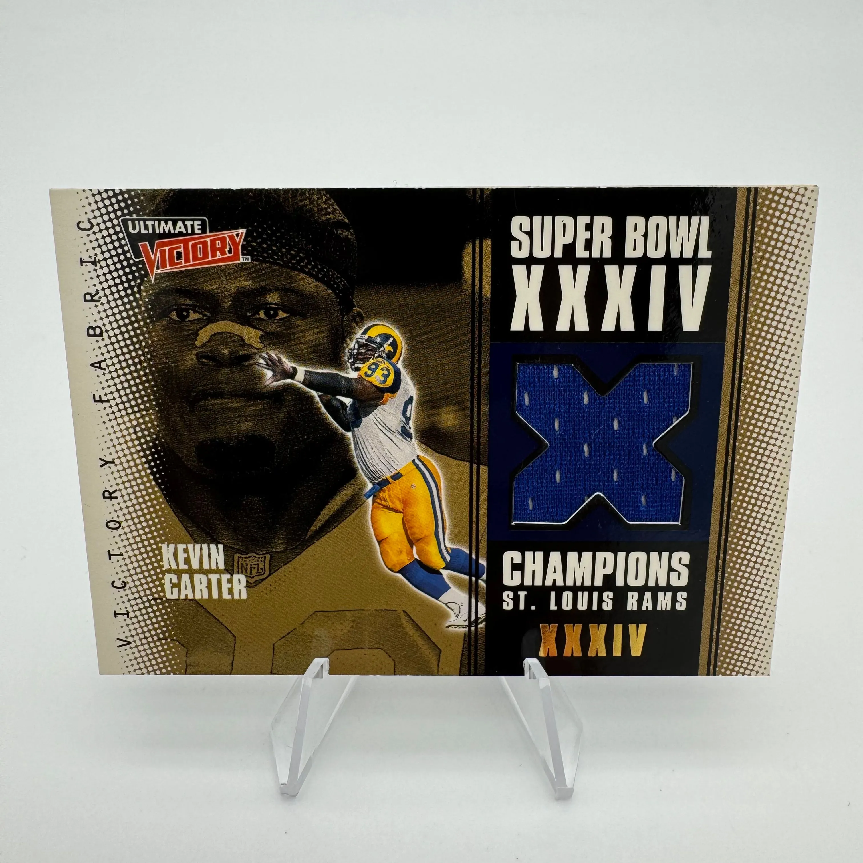 Product image for Kevin Carter 2000 Upper Deck Ultimate Victory Super Bowl XXXIV Victory Fabric