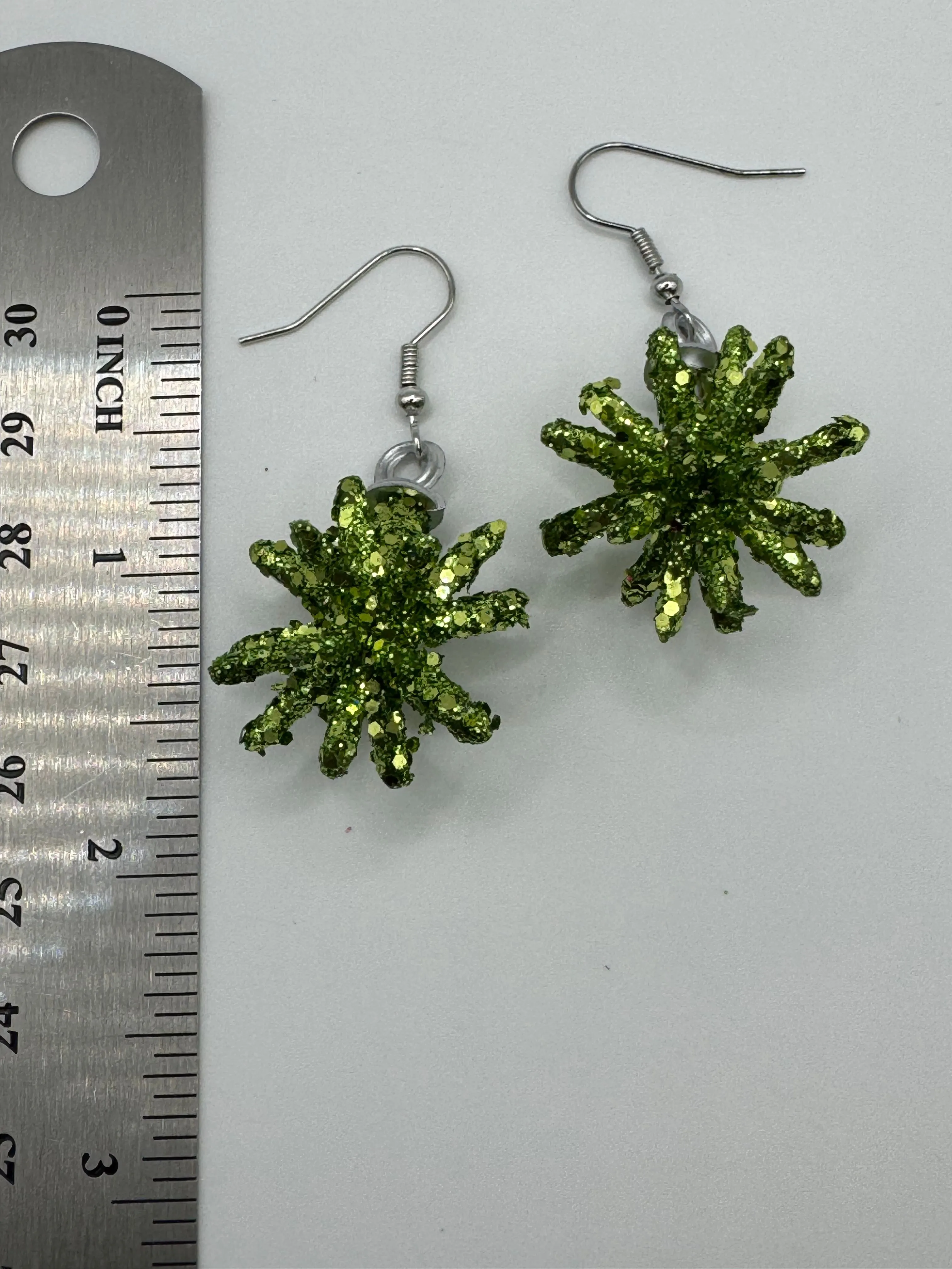 Product image for Starburst Green Glitter 3-D Earrings