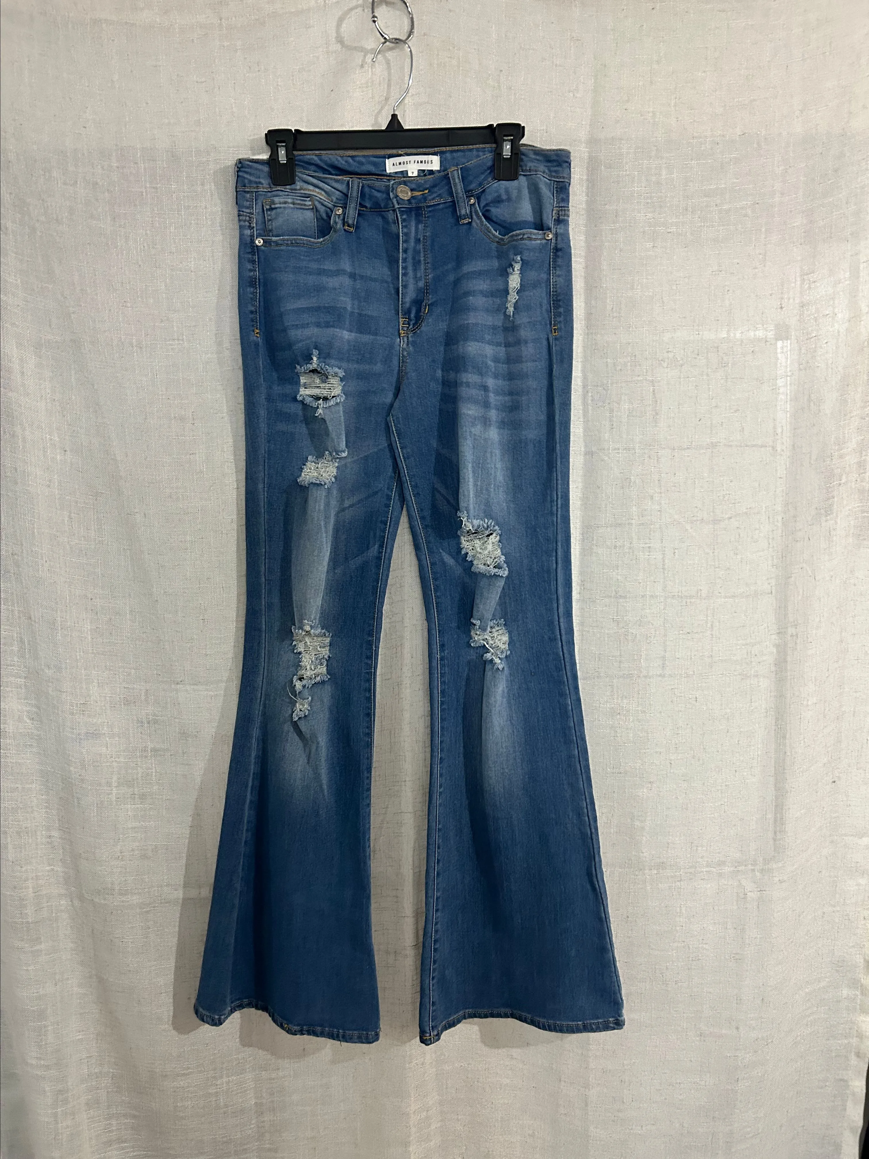 Product image for 023 Amos's Famous Distressed Flare Jeans- size 7