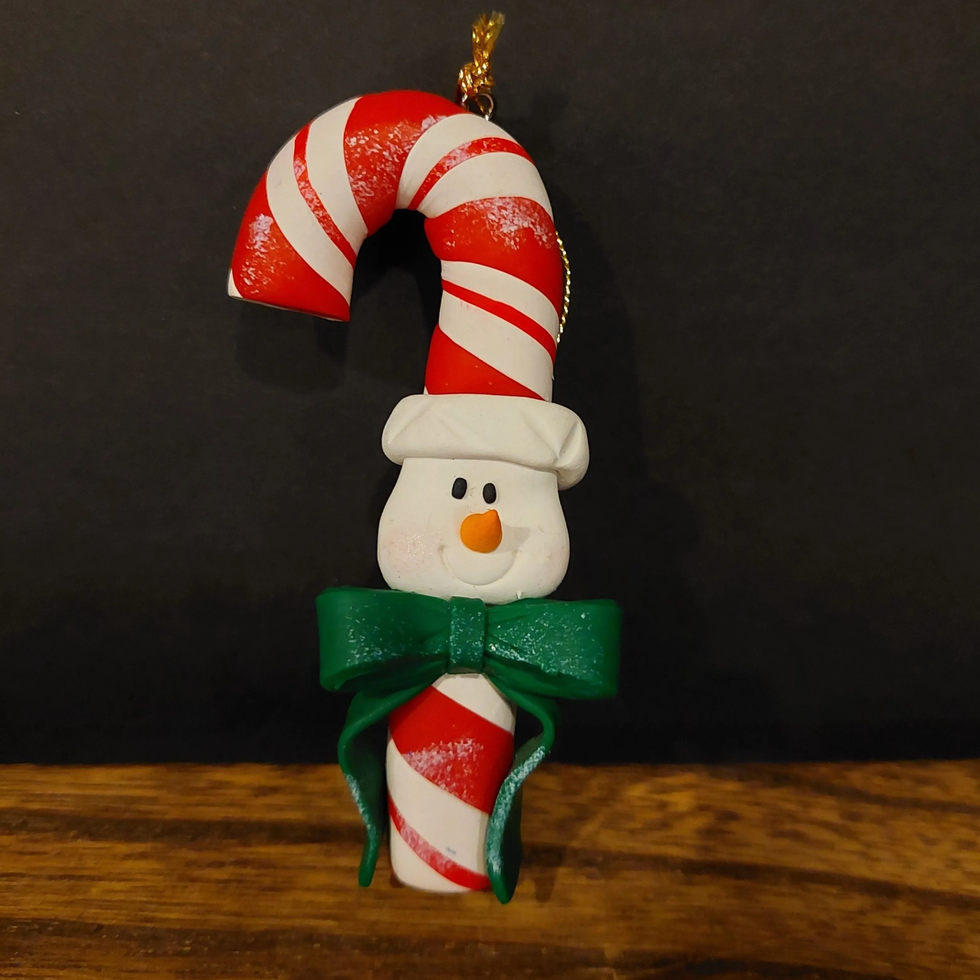Product image for 0210 Snowman Candy Cane Christmas Ornament