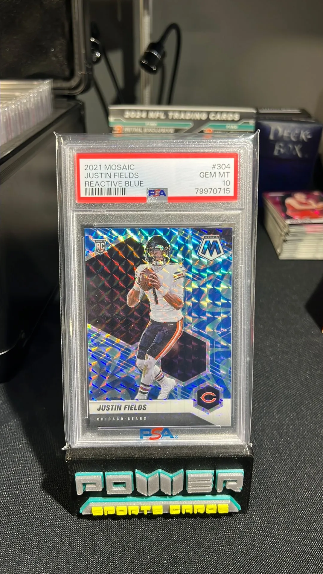 Product image for 2021 Panini Mosaic Justin Fields 304 Reactive Blue PSA GEM MT 10