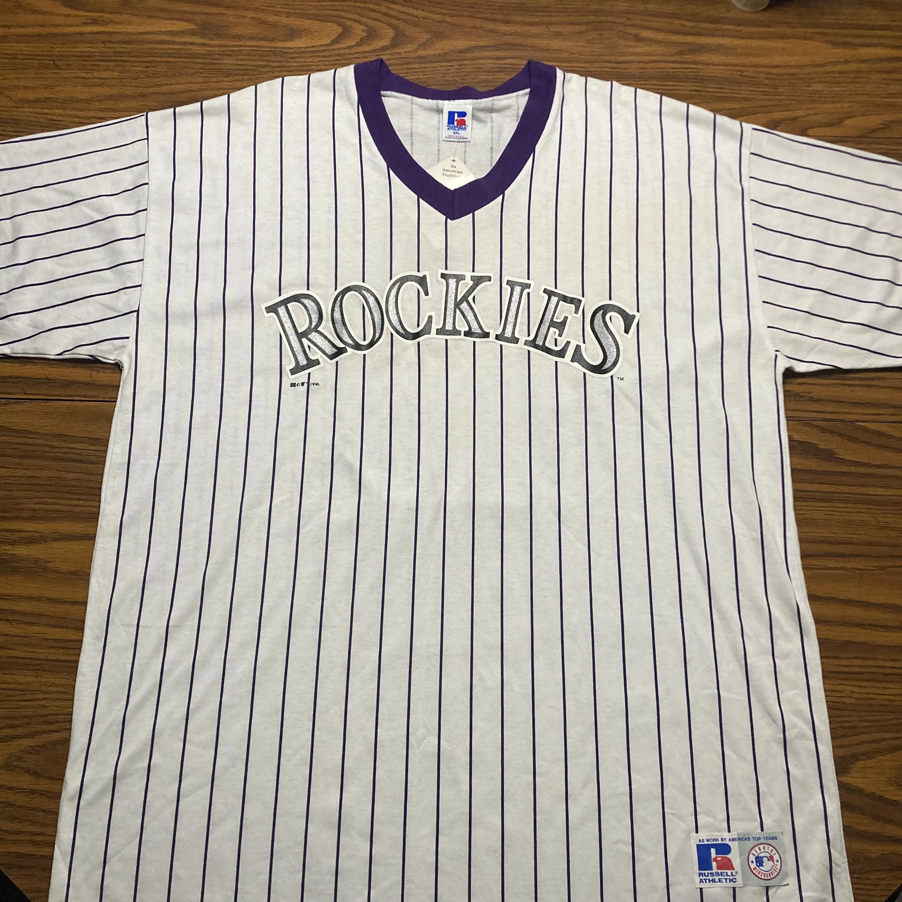 Product image for 28. New Vtg 1996 Russell Tag Colorado Rockies Pin Striped Tee #11399