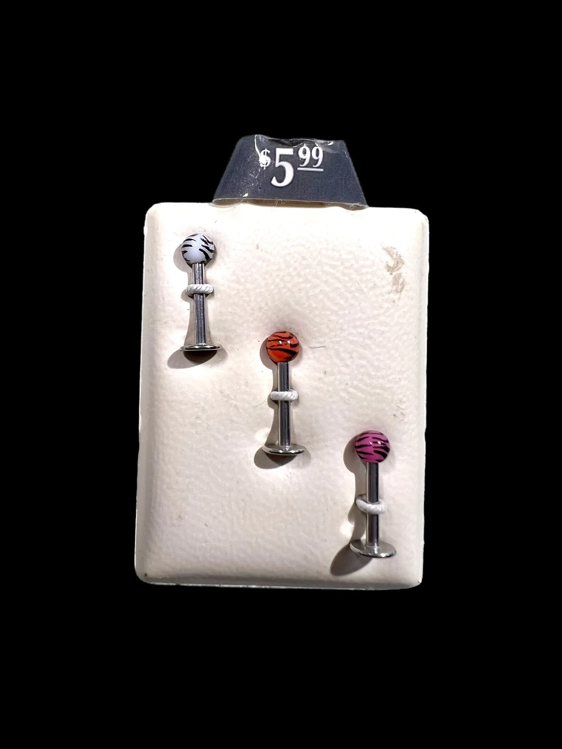 Product image for Ii. Tongue studs in animal print