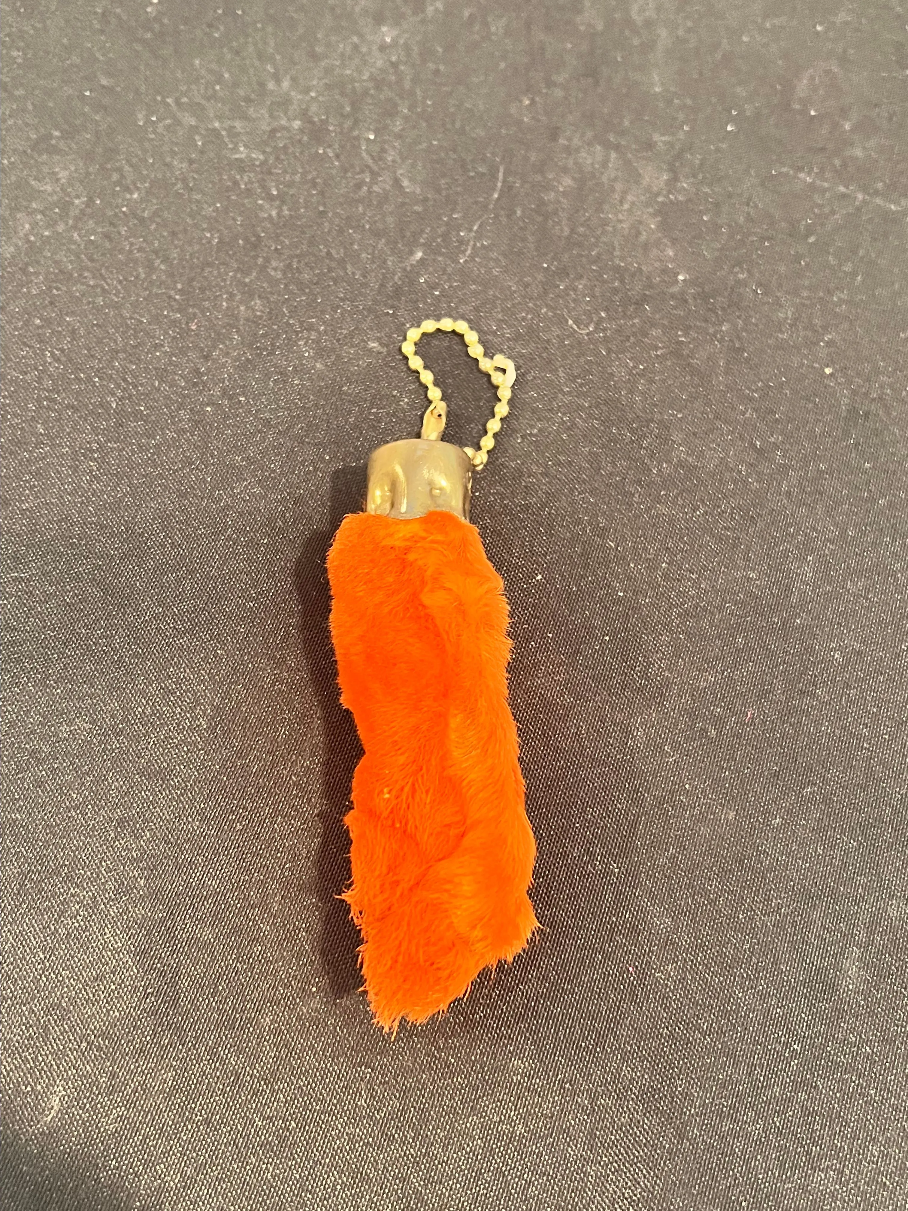 Product image for Orange lucky rabbit foot keychain