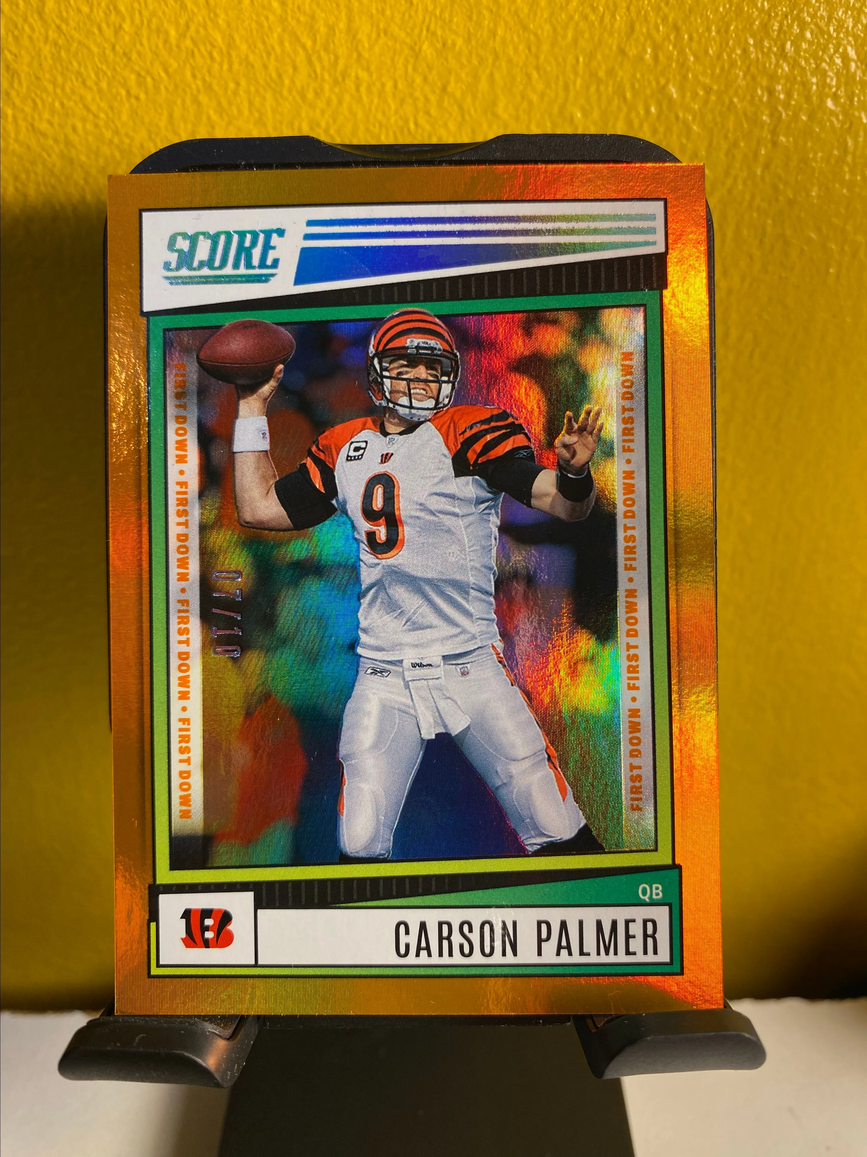Product image for Carson Palmer Orange 7/10 2022 Panini Score Color Match