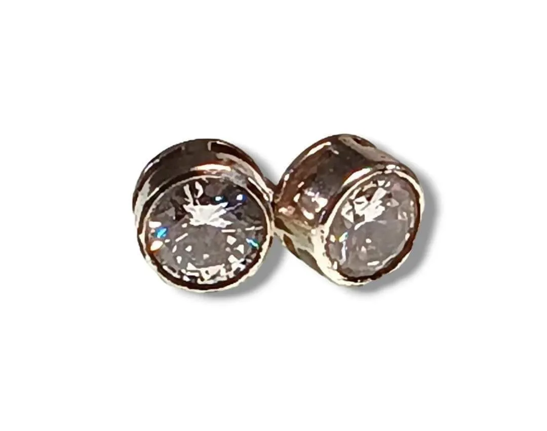 Product image for Sterling bezel set European cut 8mm crystal stud earrings. Earrings are stamped .925 and tests posit