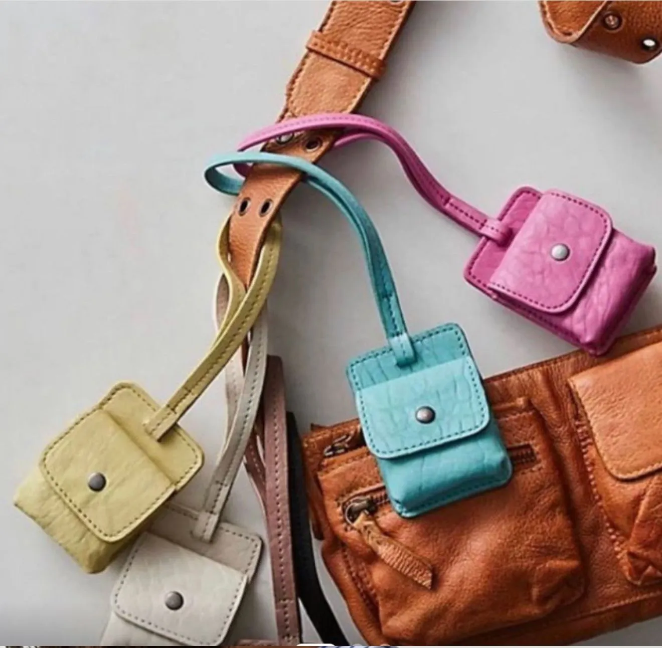Product image for A3.(TAN)NWOT FREE PEOPLE LEATHER STREET SOUNDS POD CLIP