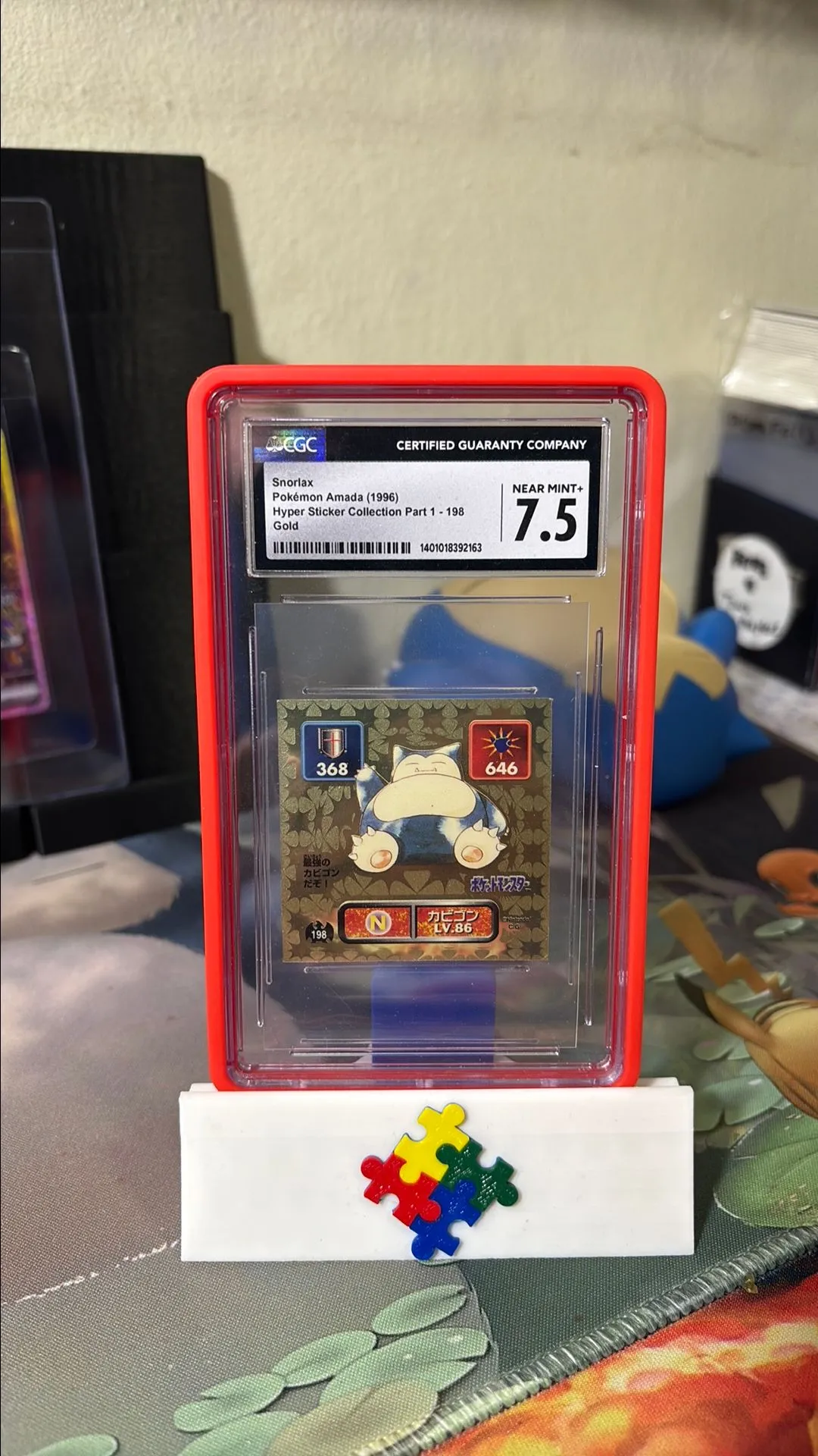 Product image for 1996 Snorlax Amada Hyper Sticker Gold 198 CGC Near Mint + 7.5