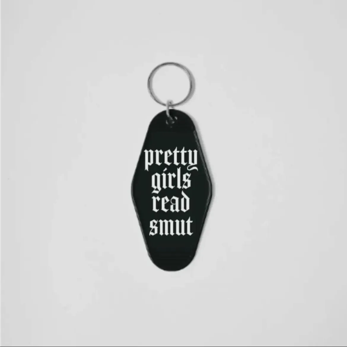 Product image for Pretty Girls Read Smut Motel Keychain
