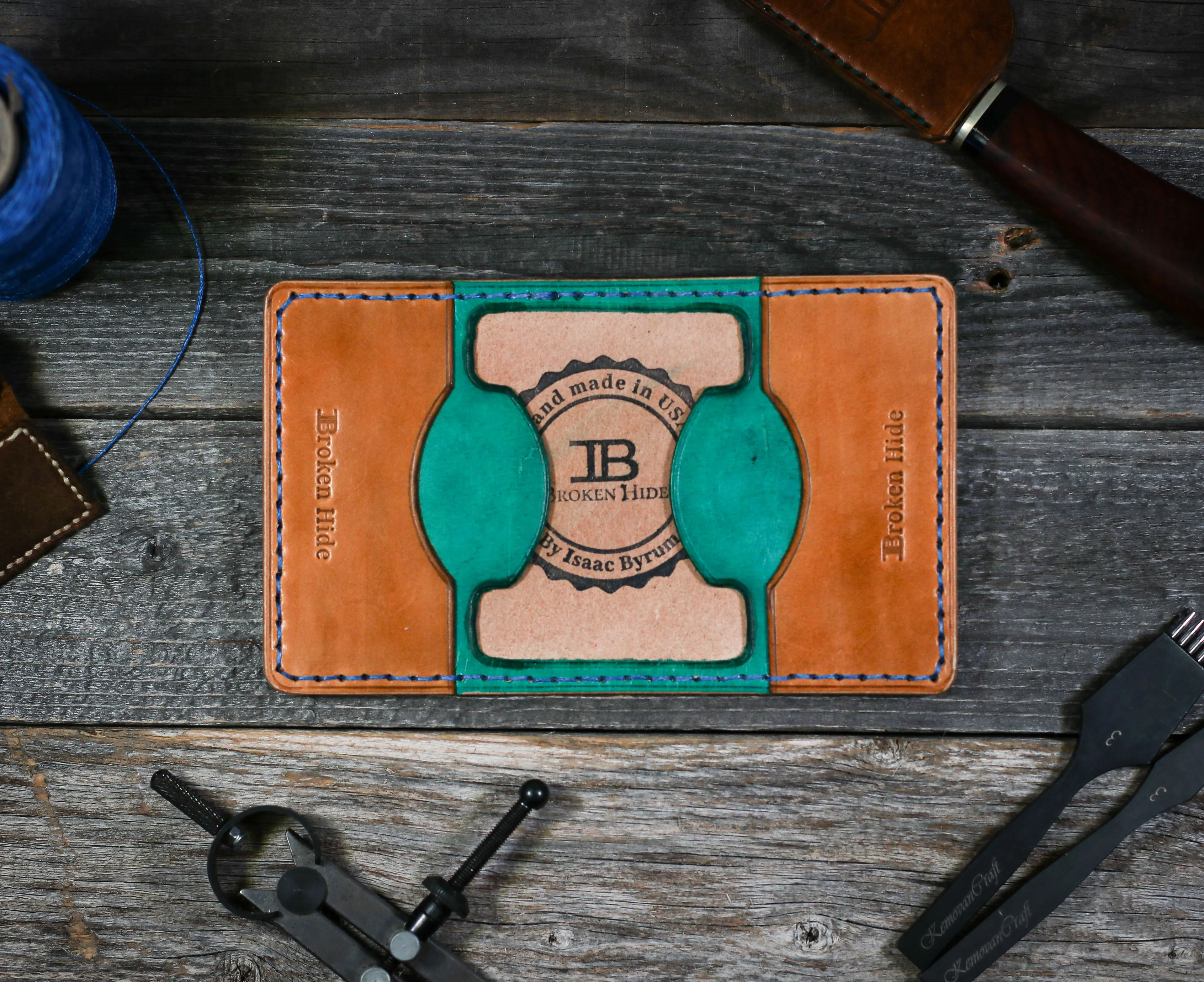 Product image for Broken Hide Bifold Wallet (Light and dark brown with turquoise accent