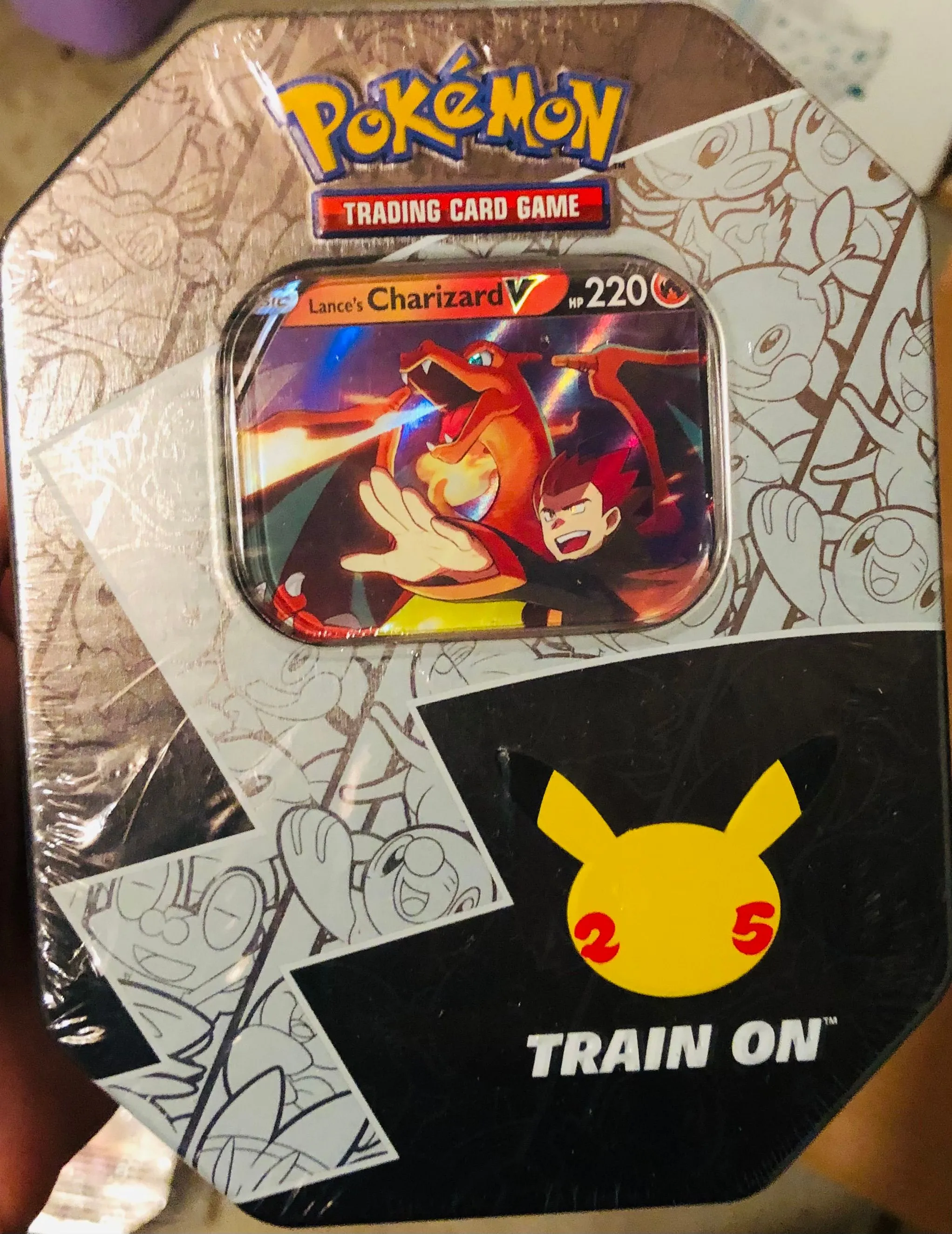 Product image for Lance Charizard Celebrations Tin