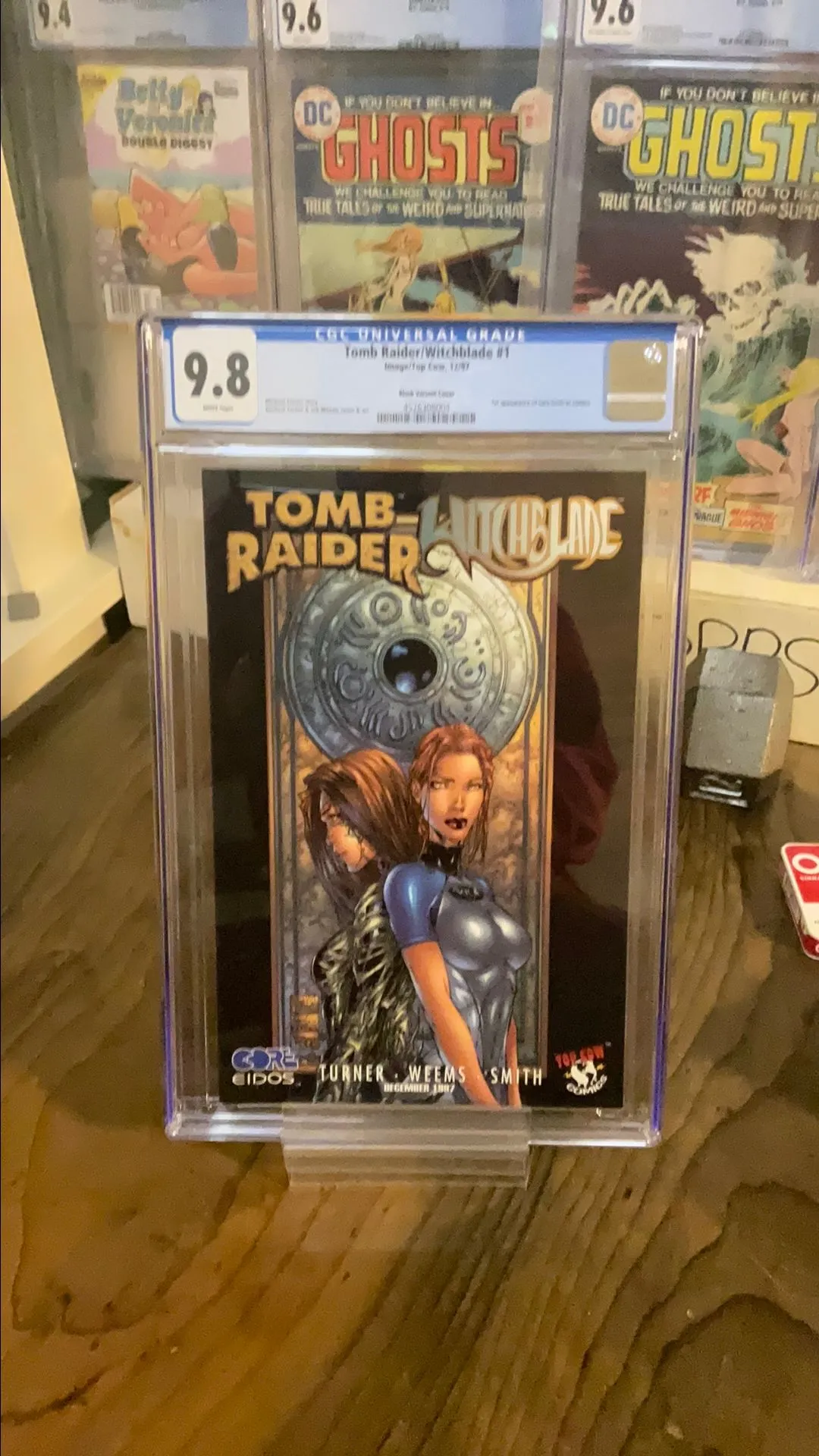 Product image for CGC 9.8 Tomb Raider/Witchblade #1 Black variant