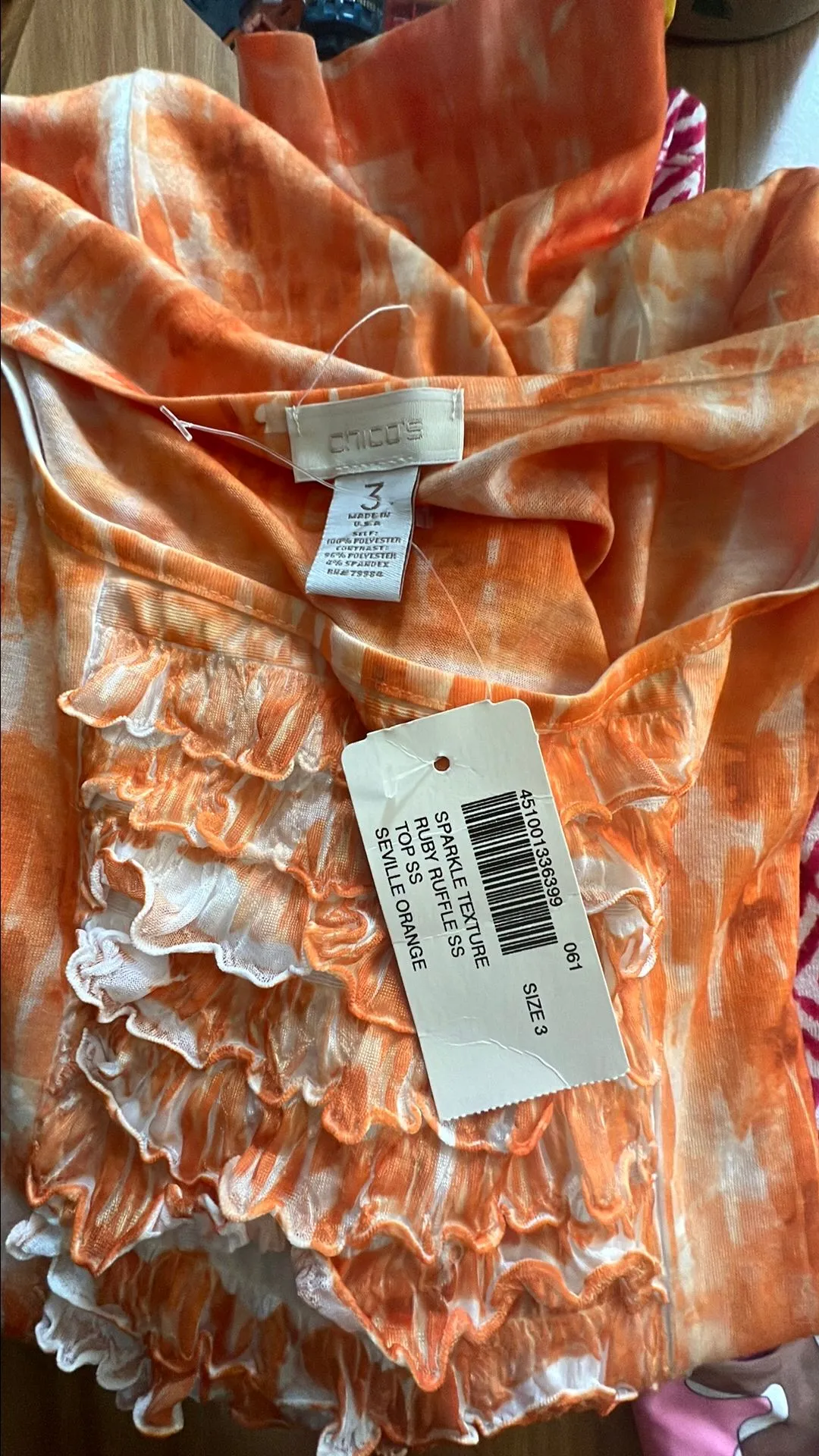 Product image for Nwt Chico’s sparkle, texture, Ruby, ruffle, SS top Seville orange size 3