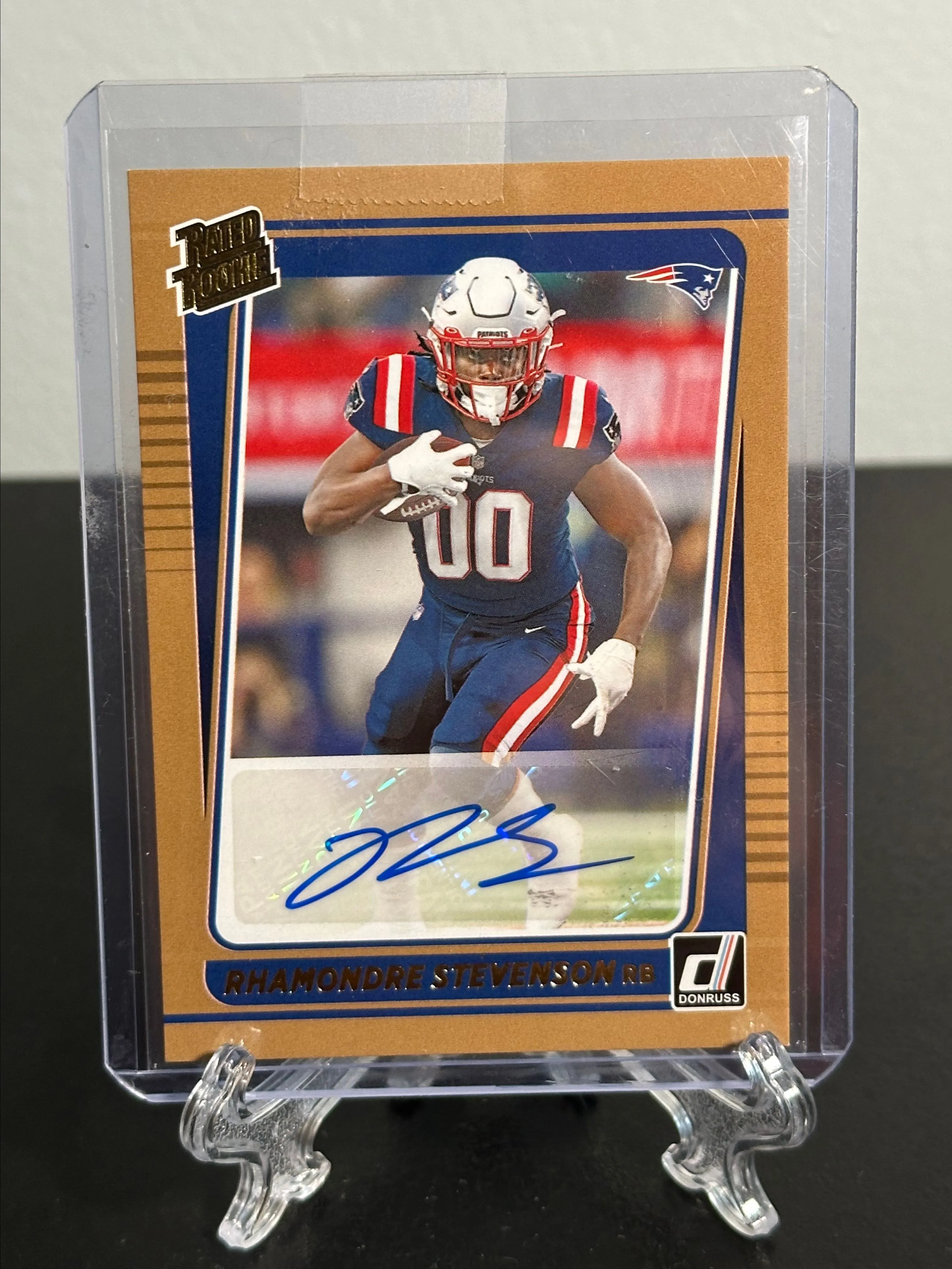 Product image for 2021 Rhamondre Stevenson Panini Donruss Rated Rookie RC Bronze Auto