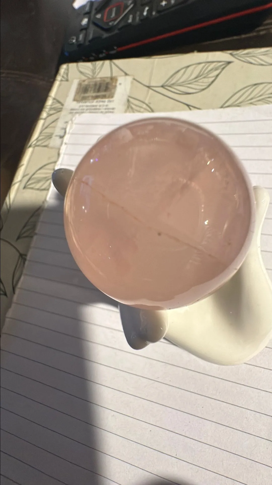 Product image for Rose quartz sphere with ceramic hand holder