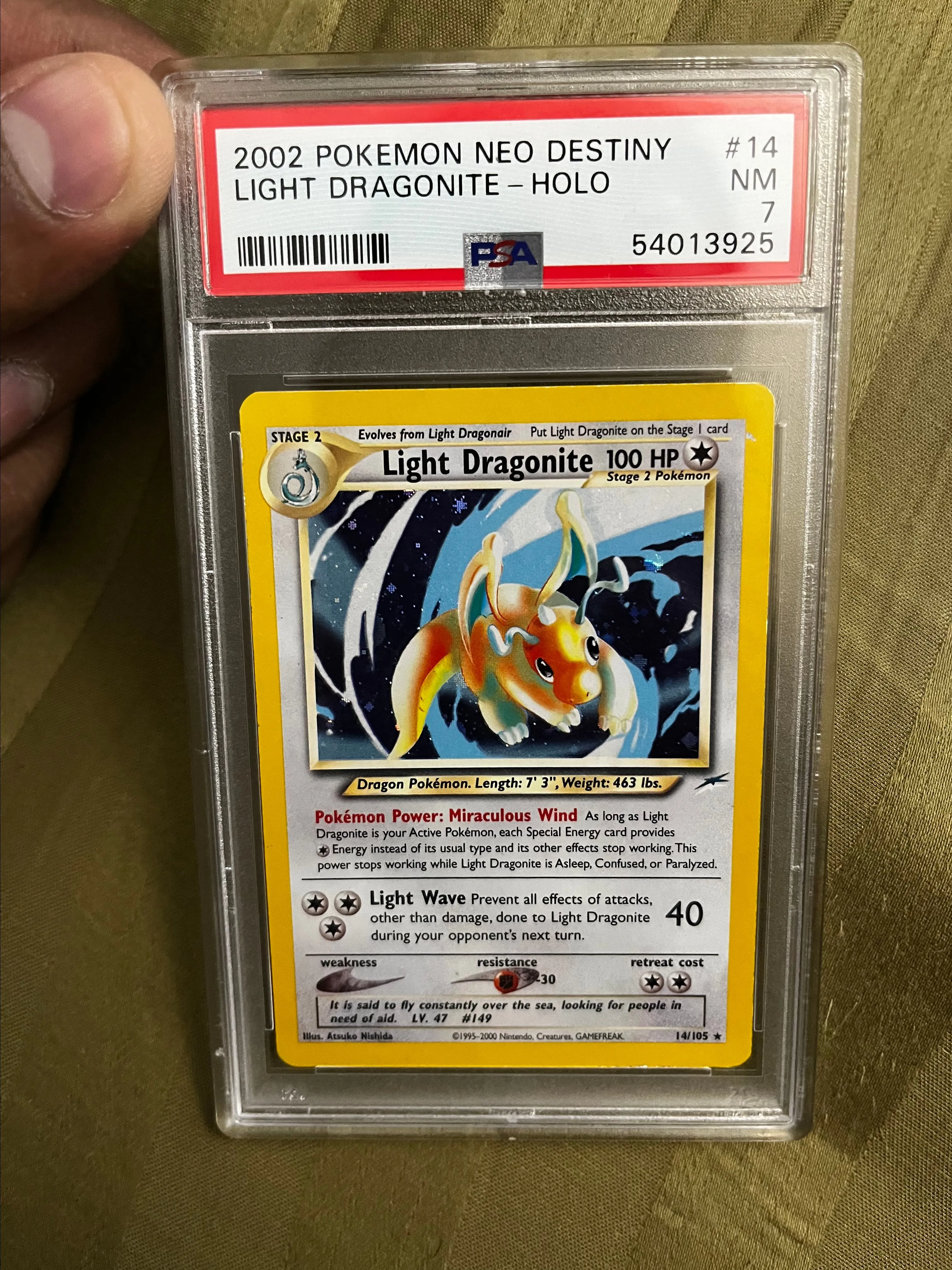 Product image for PSA 7 Light Dragonite Neo Destiny Unlimited Holo