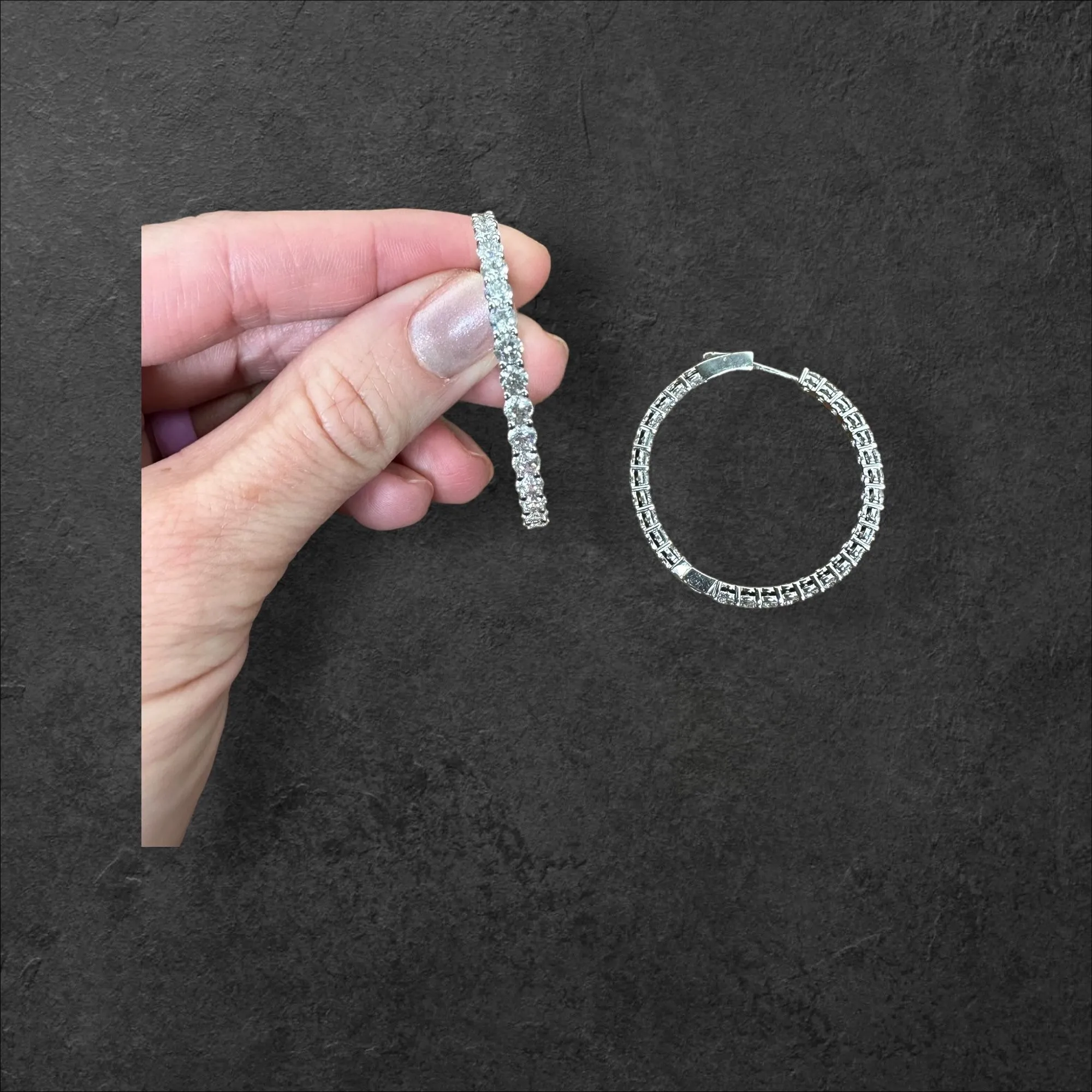 Product image for Cubic zirconia silver hoop earrings.
