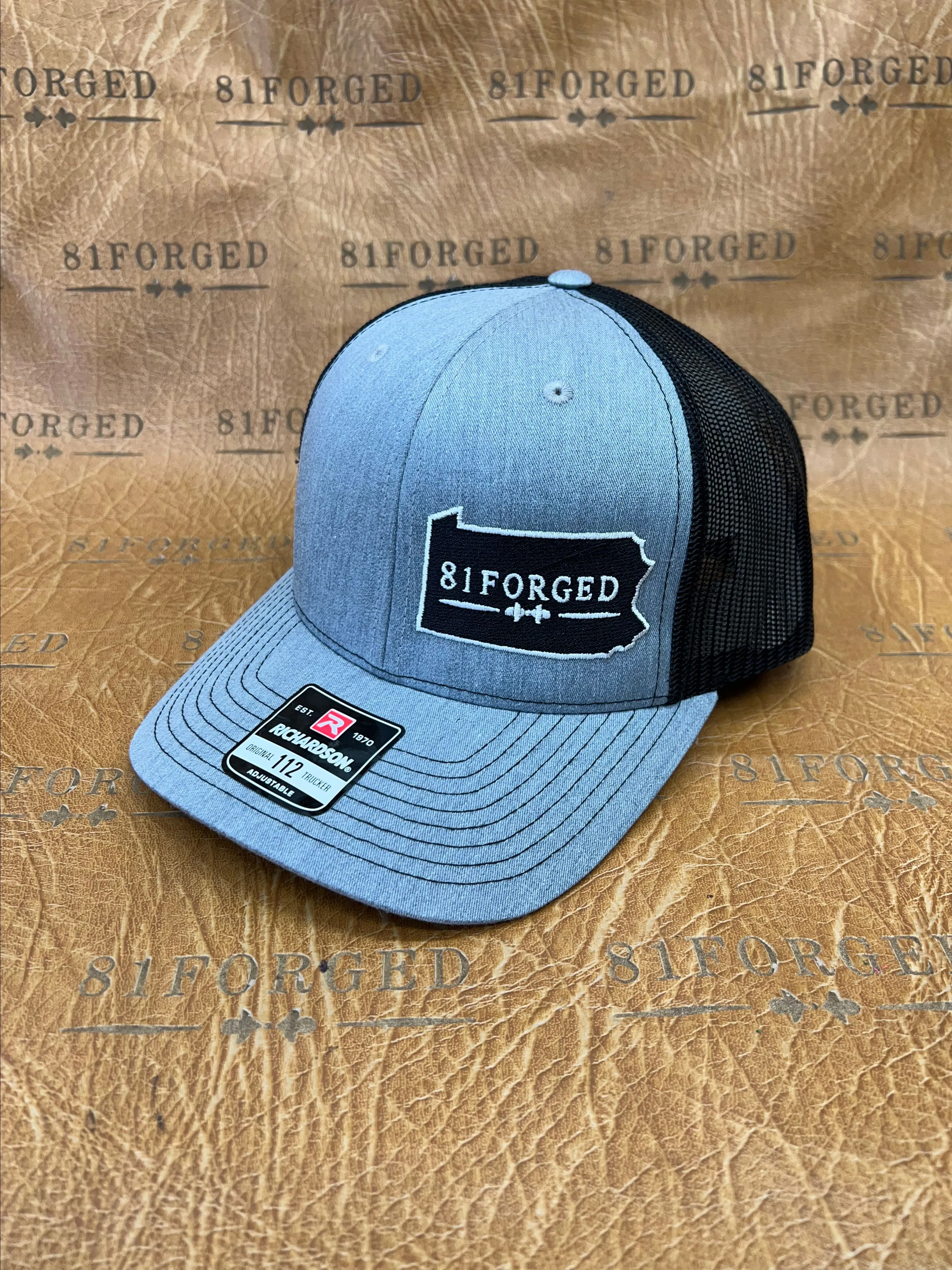 Product image for Gray Richardson 112 hat with the 81Forged Logo.